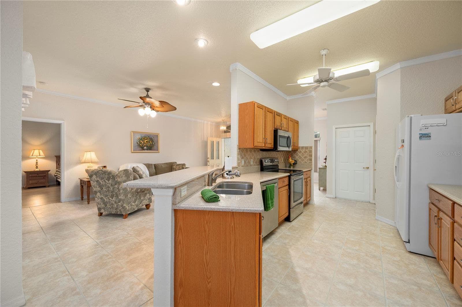 Breakfast bar, open to great room - 1637 PALACE CT, PORT CHARLOTTE