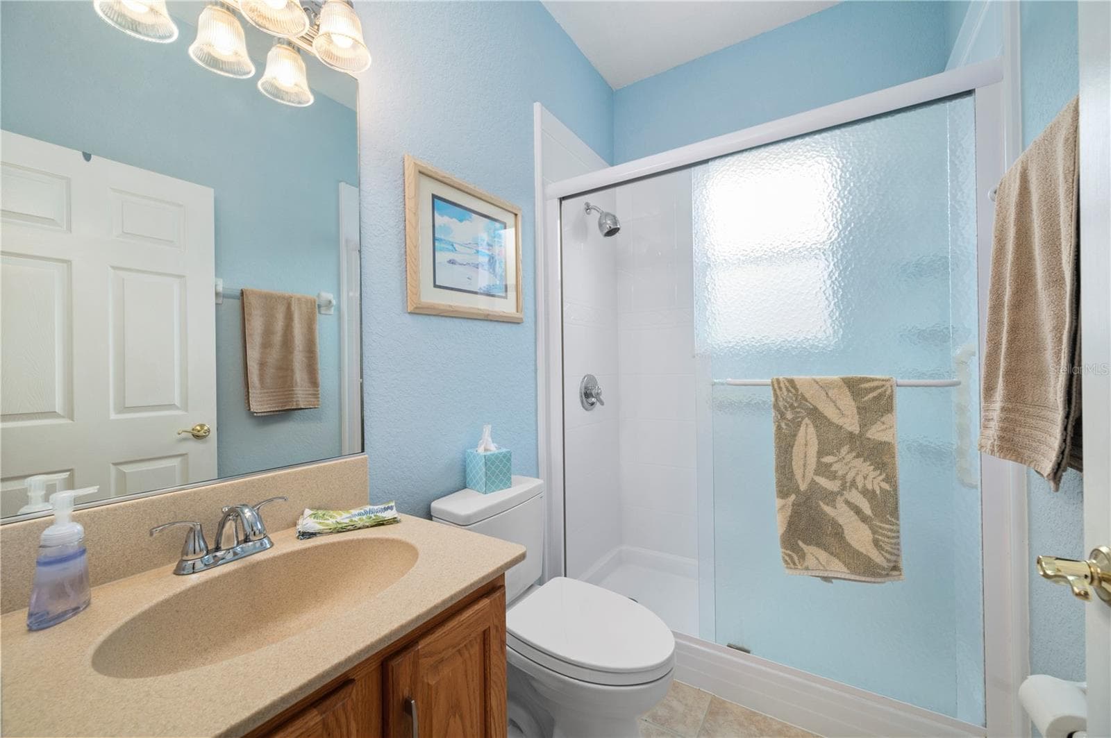 Guest bath has newly installed shower with glass doors - 1637 PALACE CT, PORT CHARLOTTE