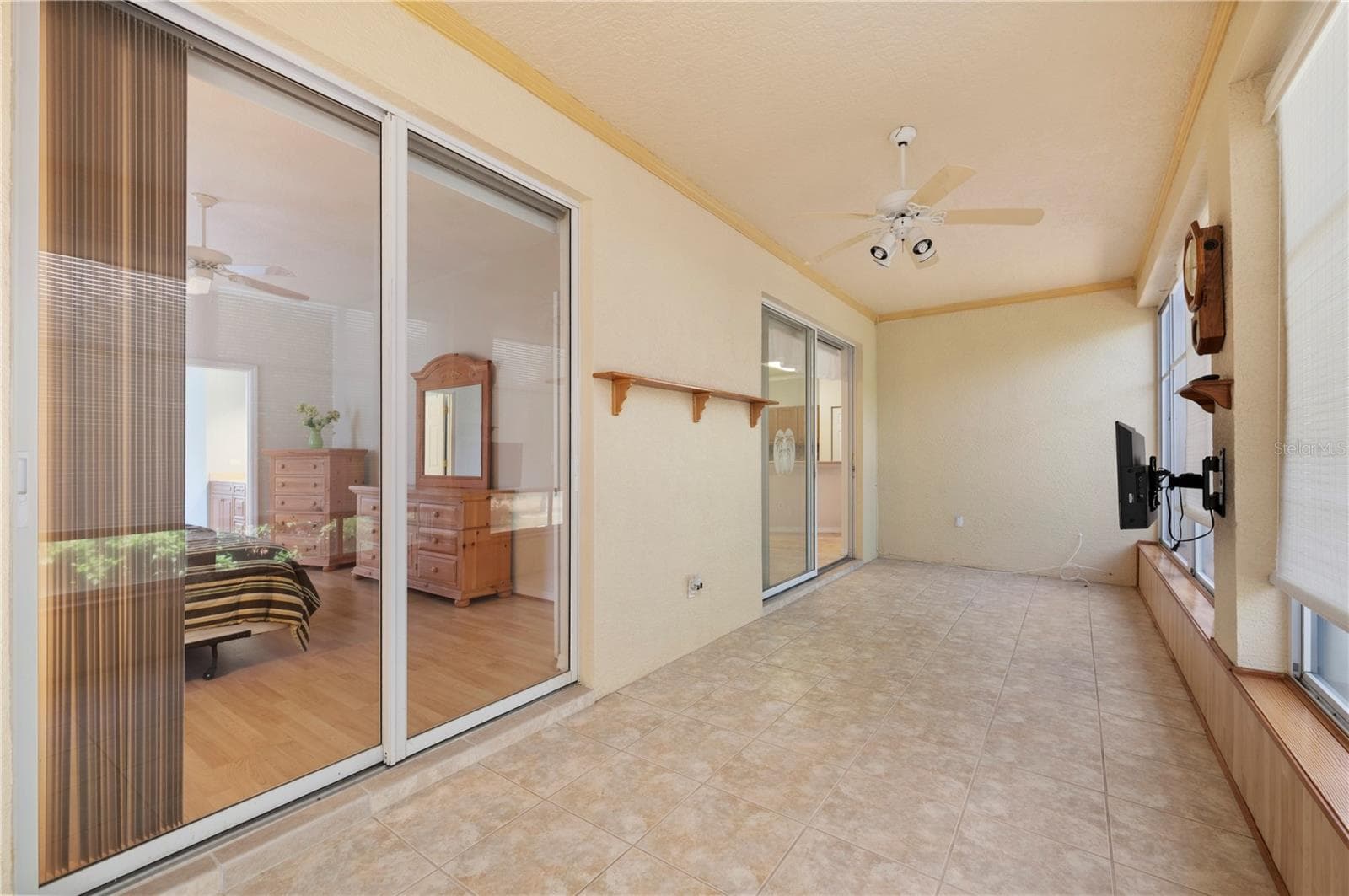 The lanai has 8' slider access to Primary and Living rooms - 1637 PALACE CT, PORT CHARLOTTE
