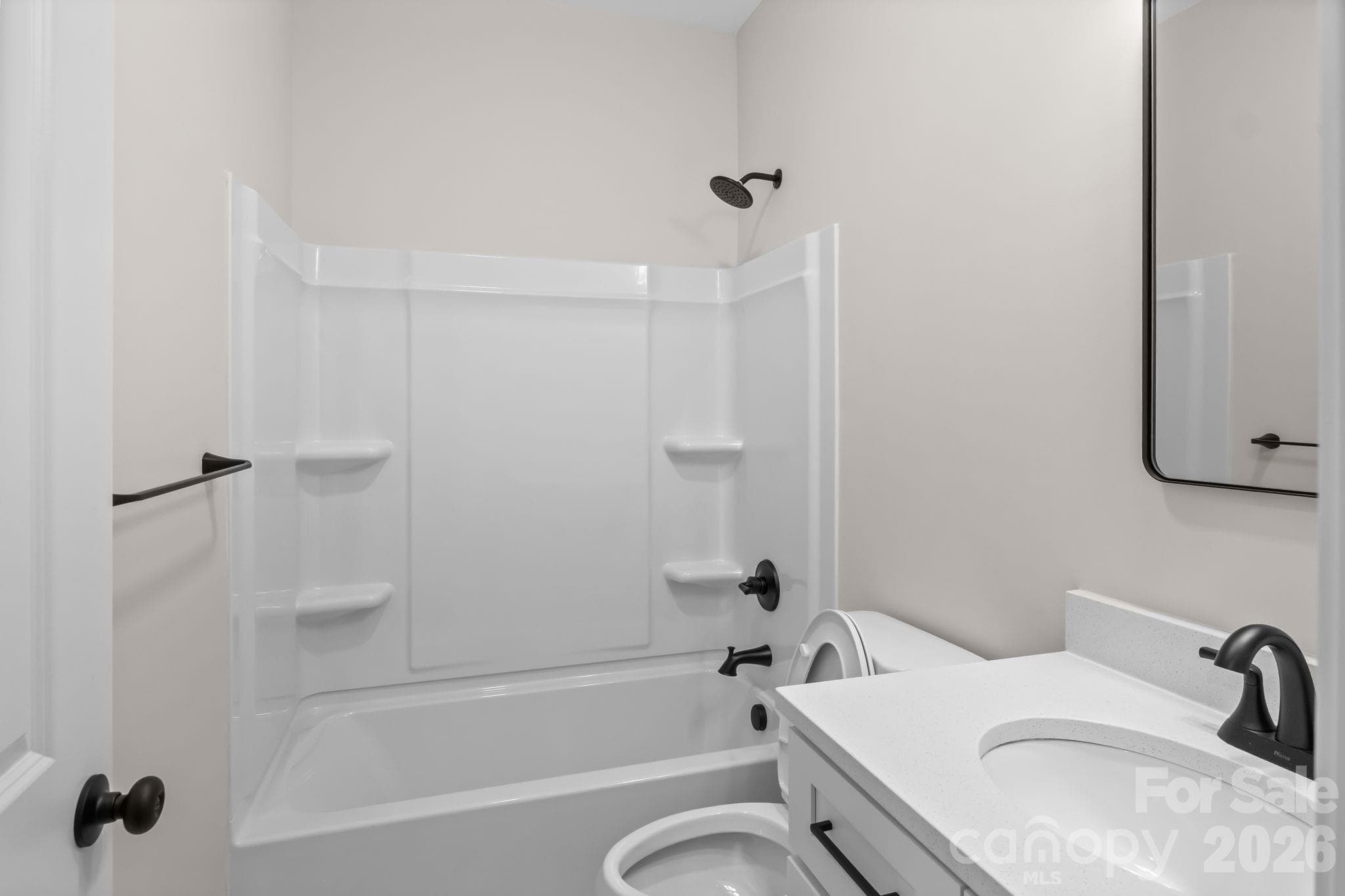 Black fixtures in bathroom - 2123 Woodhurst Lane, Albemarle