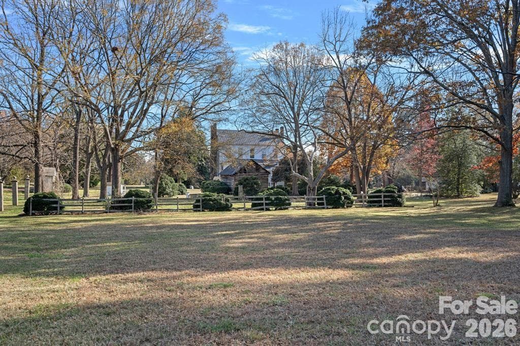 Property is level and has lots of native perennials. - Mooresville