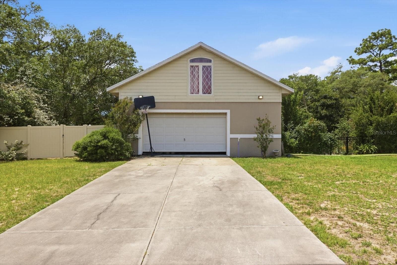 Detached garage 30x40 concrete block & stucco, with separate workshop and in law suite on the 2nd floor - 8720 N TROJAN DR, CITRUS SPRINGS