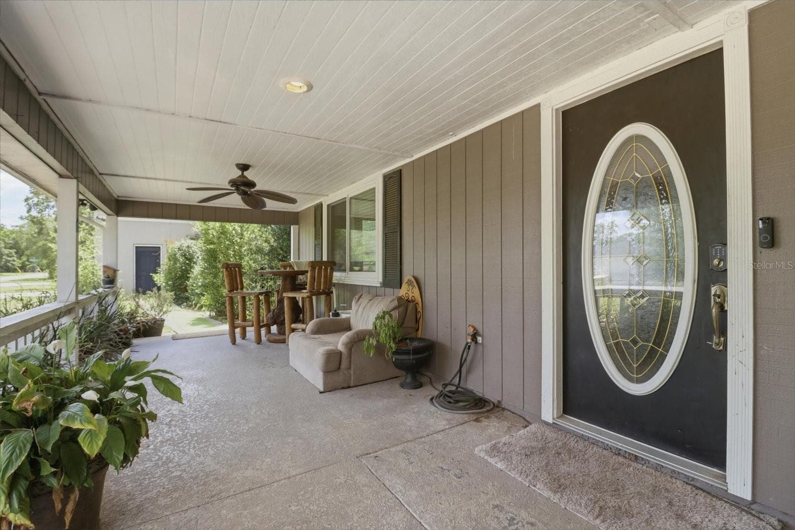 Expansive front porch - 8720 N TROJAN DR, CITRUS SPRINGS