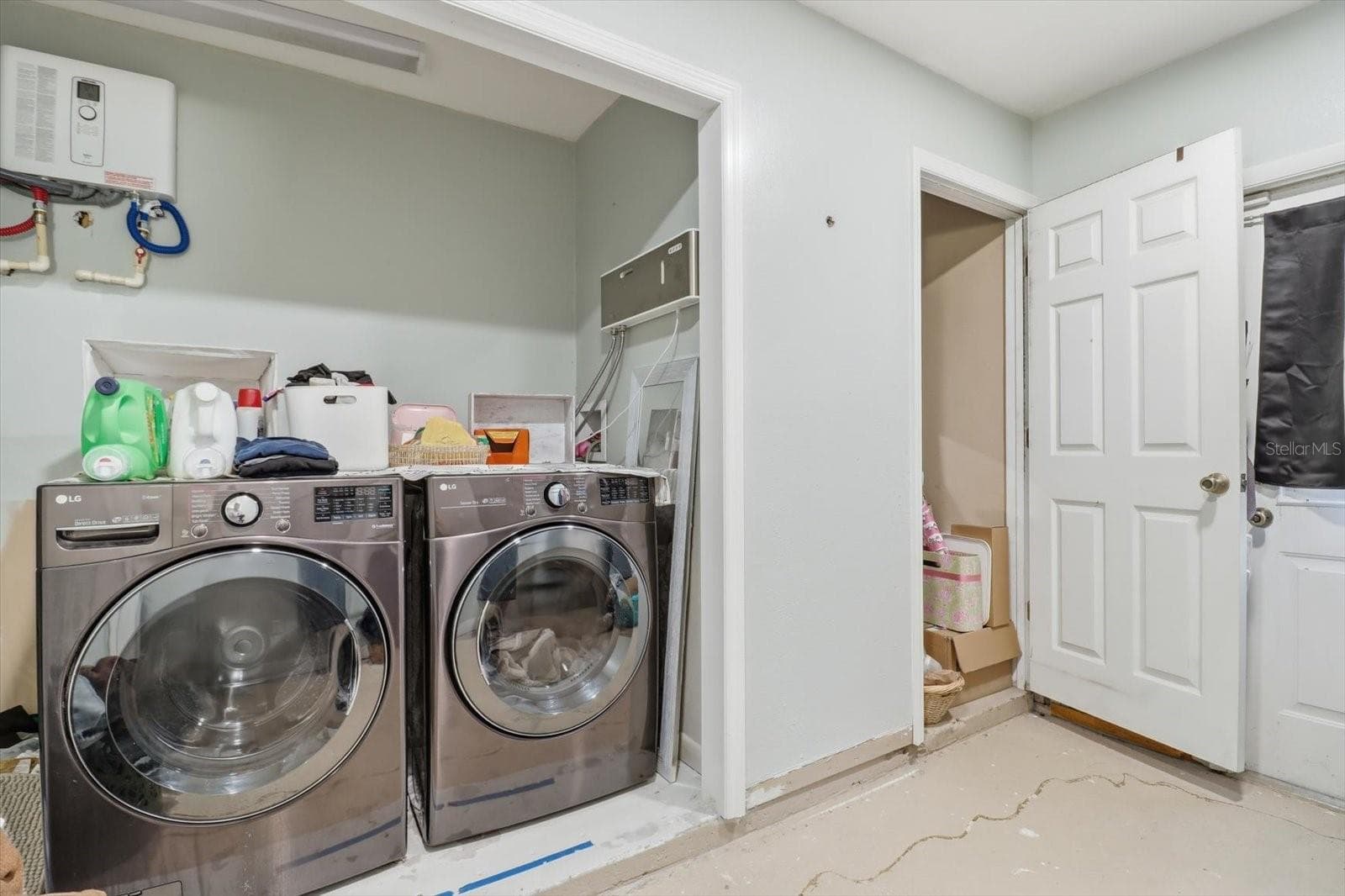 separate laundry room - 8720 N TROJAN DR, CITRUS SPRINGS