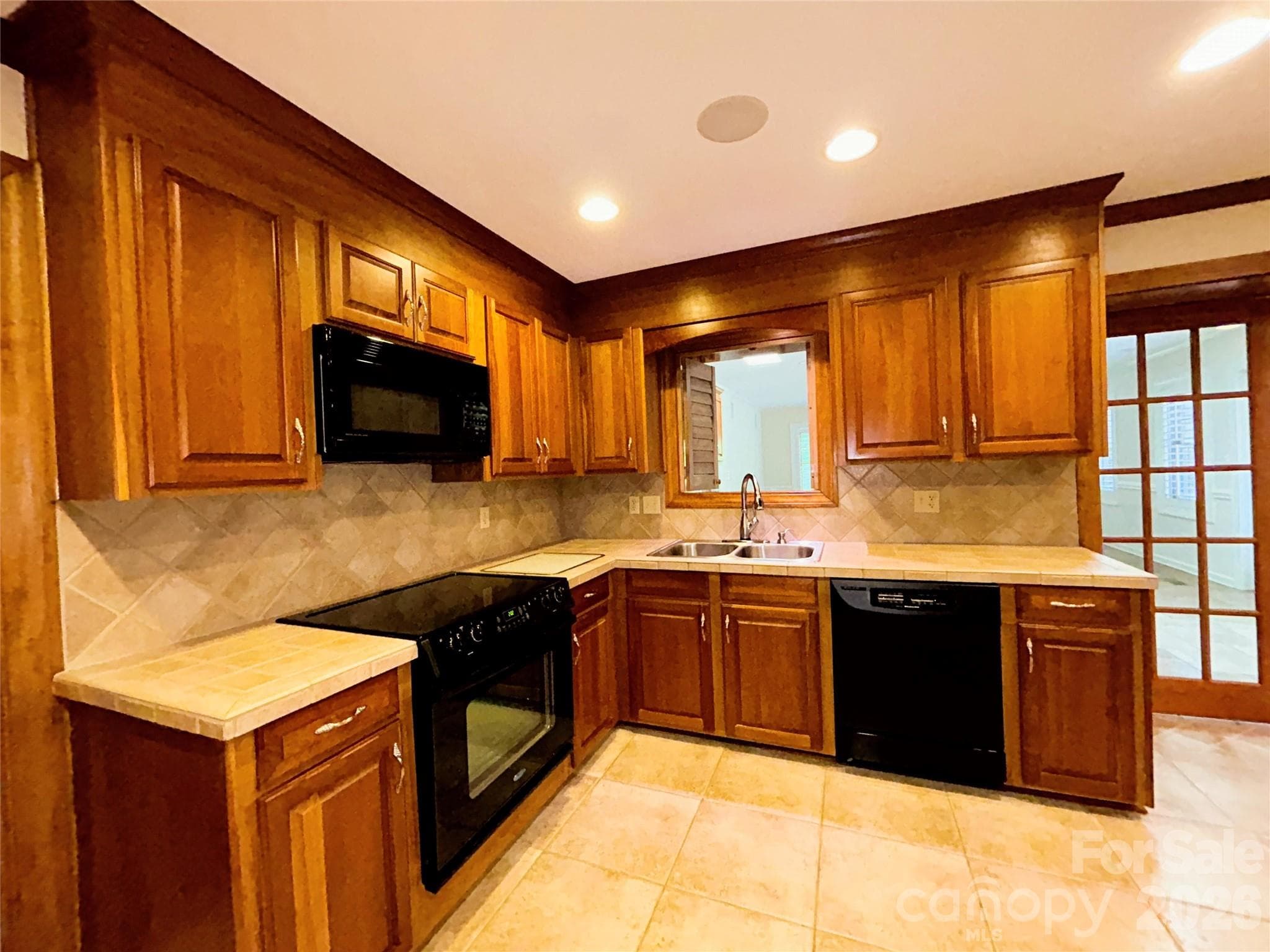 Kitchen has custom cabinetry - 900 Courtney Court SE, Concord