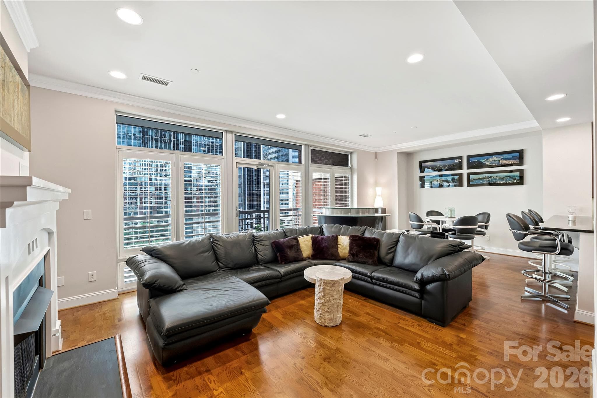 Soaring 10'8" ceilings, hardwood floors and expansive park-facing windows. - 435 S Tryon Street, Charlotte