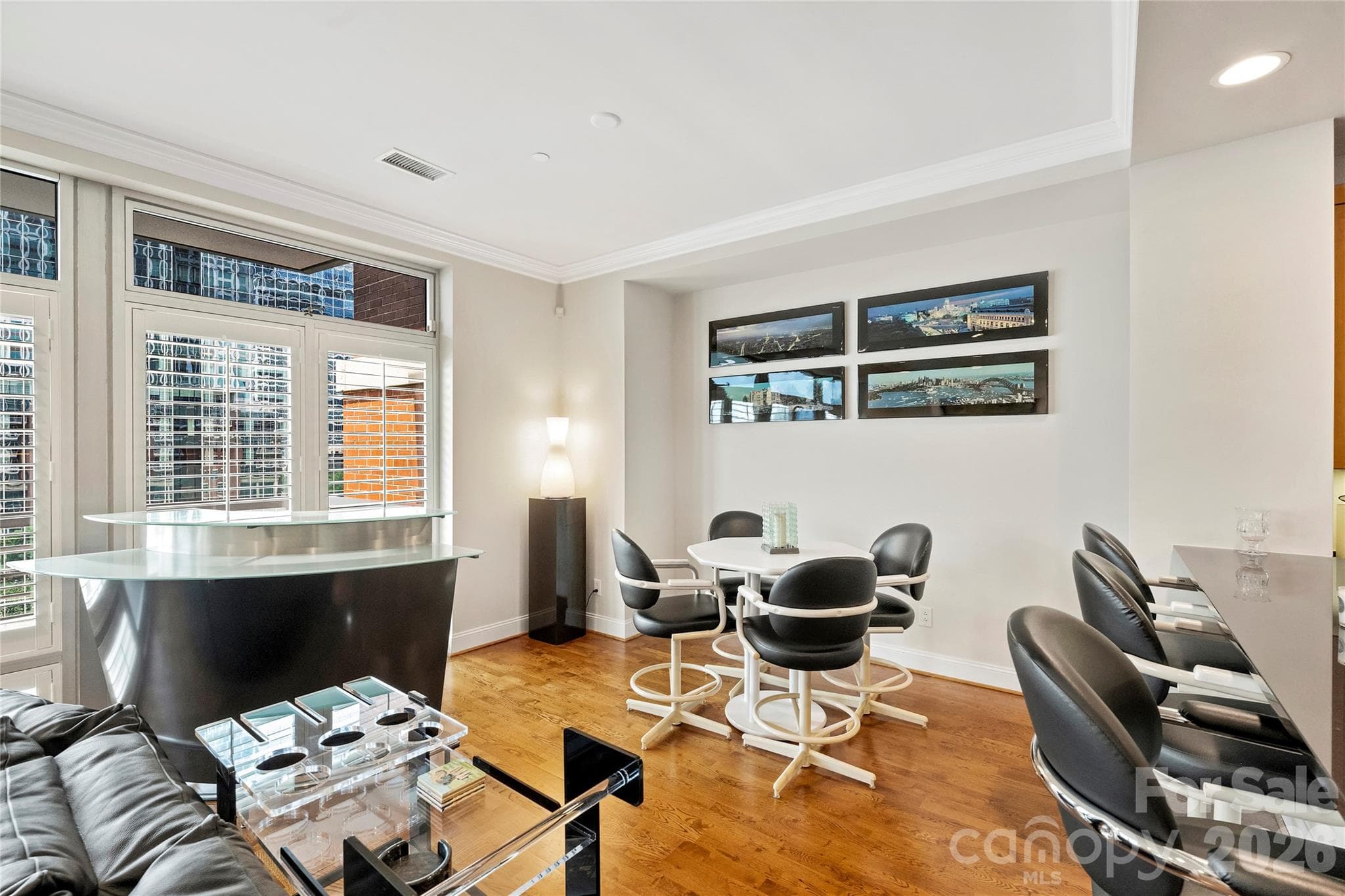 Timeless interior details include extensive moldings, hardwood floors and exceptional natural light. - 435 S Tryon Street, Charlotte