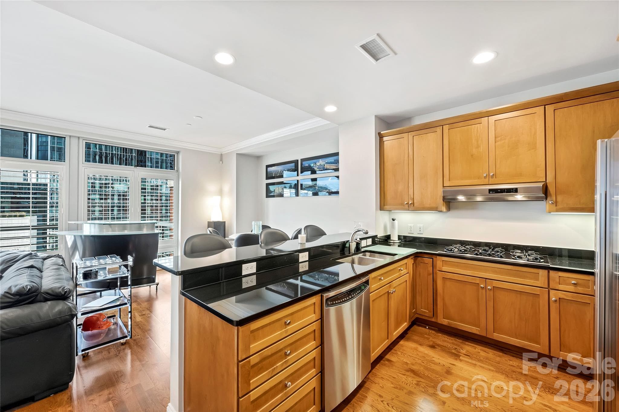Spacious kitchen open to the main living and dining areas. - 435 S Tryon Street, Charlotte
