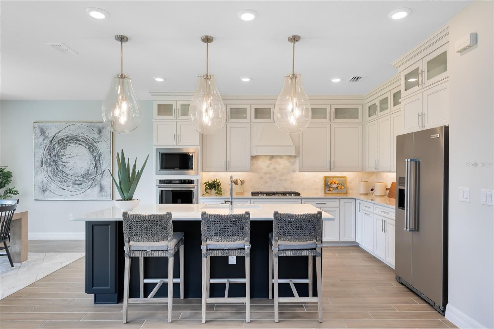 Model Home Design Only. Pictures and furnishings are for illustrative purposes only. Elevations, colors and options may vary. Furniture is for model home staging only. - 5249 HANDSOME HILLS DRIVE, MOUNT DORA