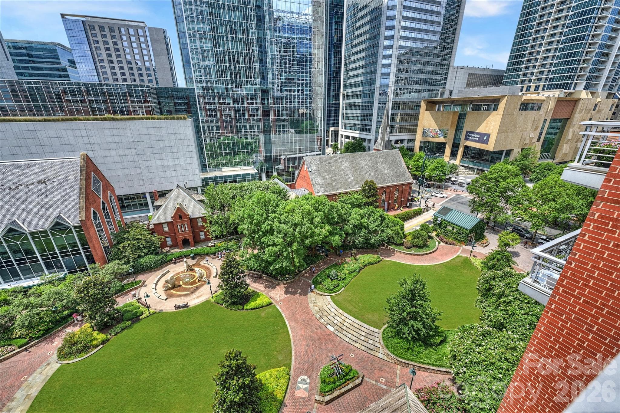 Uptown Charlotte surrounds you while The Green sits directly below. - 435 S Tryon Street, Charlotte
