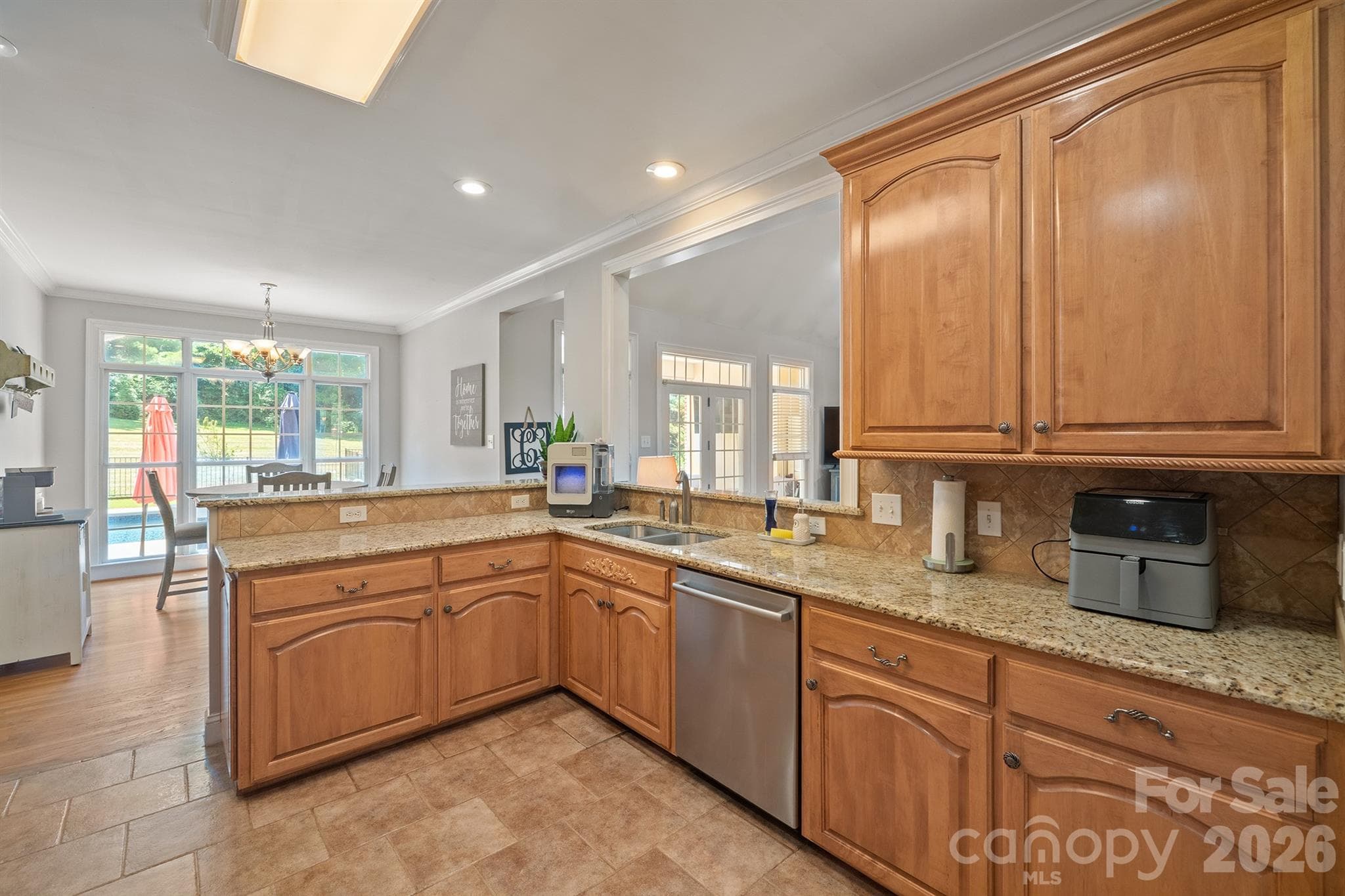Kitchen with granite counters and stainless steel appliances - Statesville