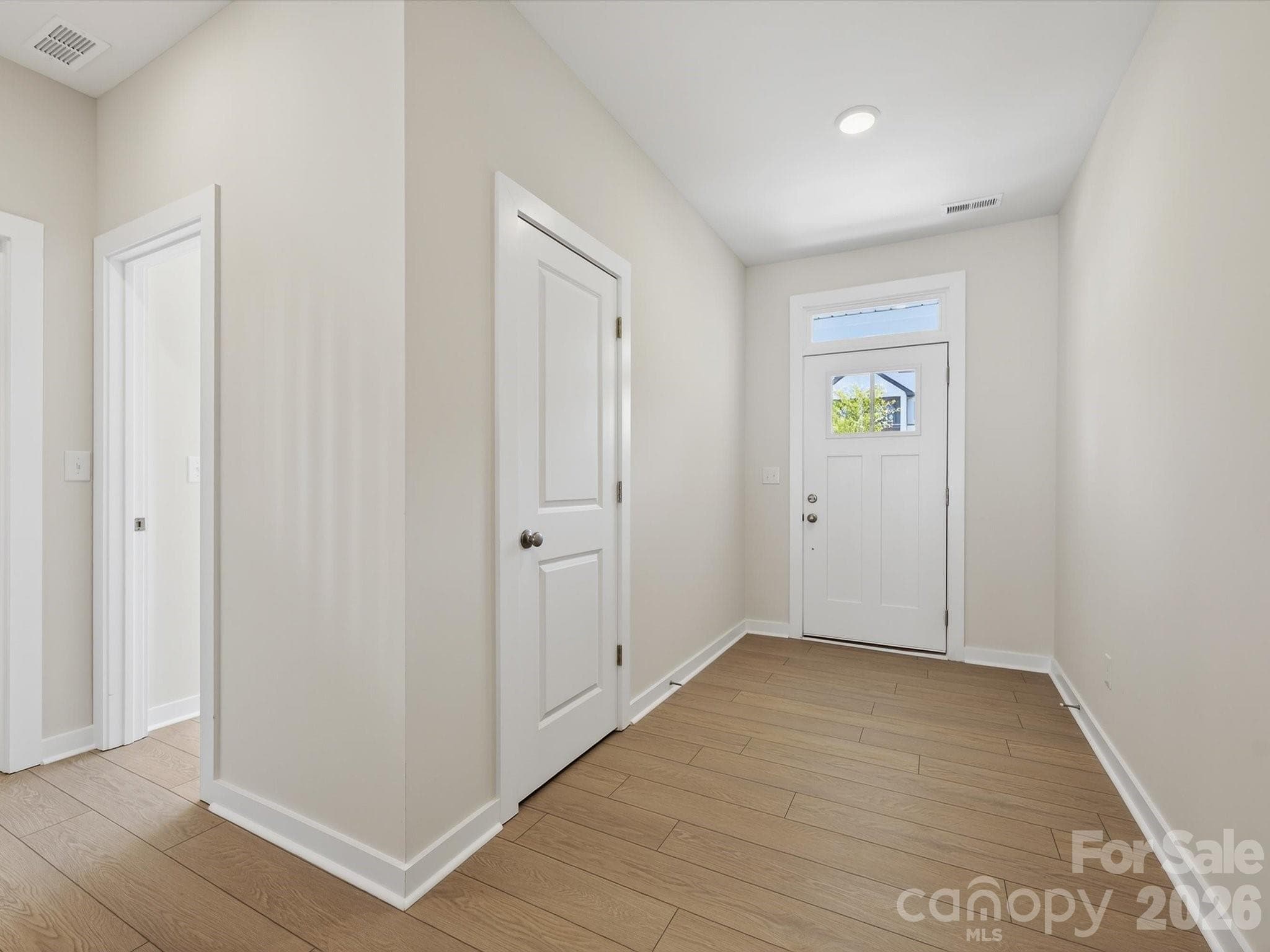 Foyer with coat closet and entrance to Bedroom #4 - Huntersville