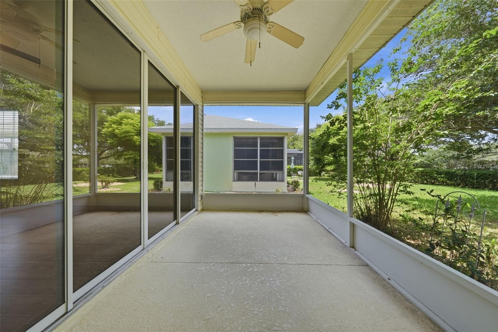 Screened Back Patio - 4962 RAINBOW TROUT RD, TAVARES