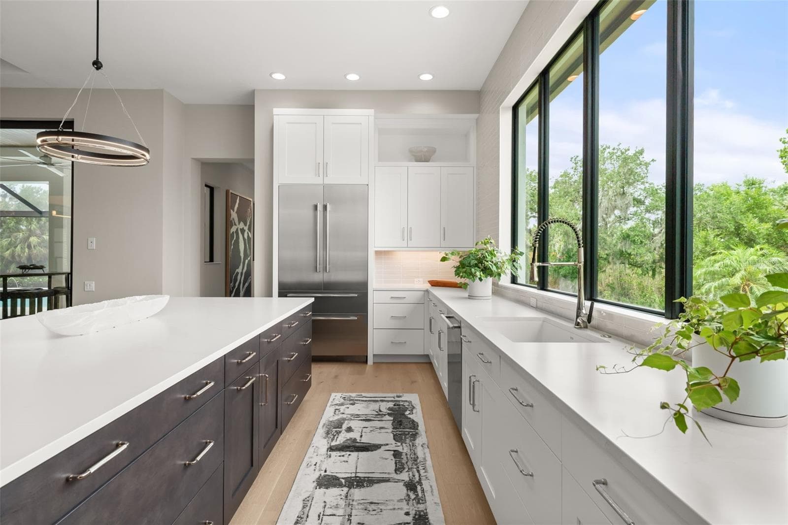 It is equipped with all high-end appliances - Thermador 42-inch built-in refrigerator and Thermador dishwasher. - 11721 RIVE ISLE RUN, PARRISH