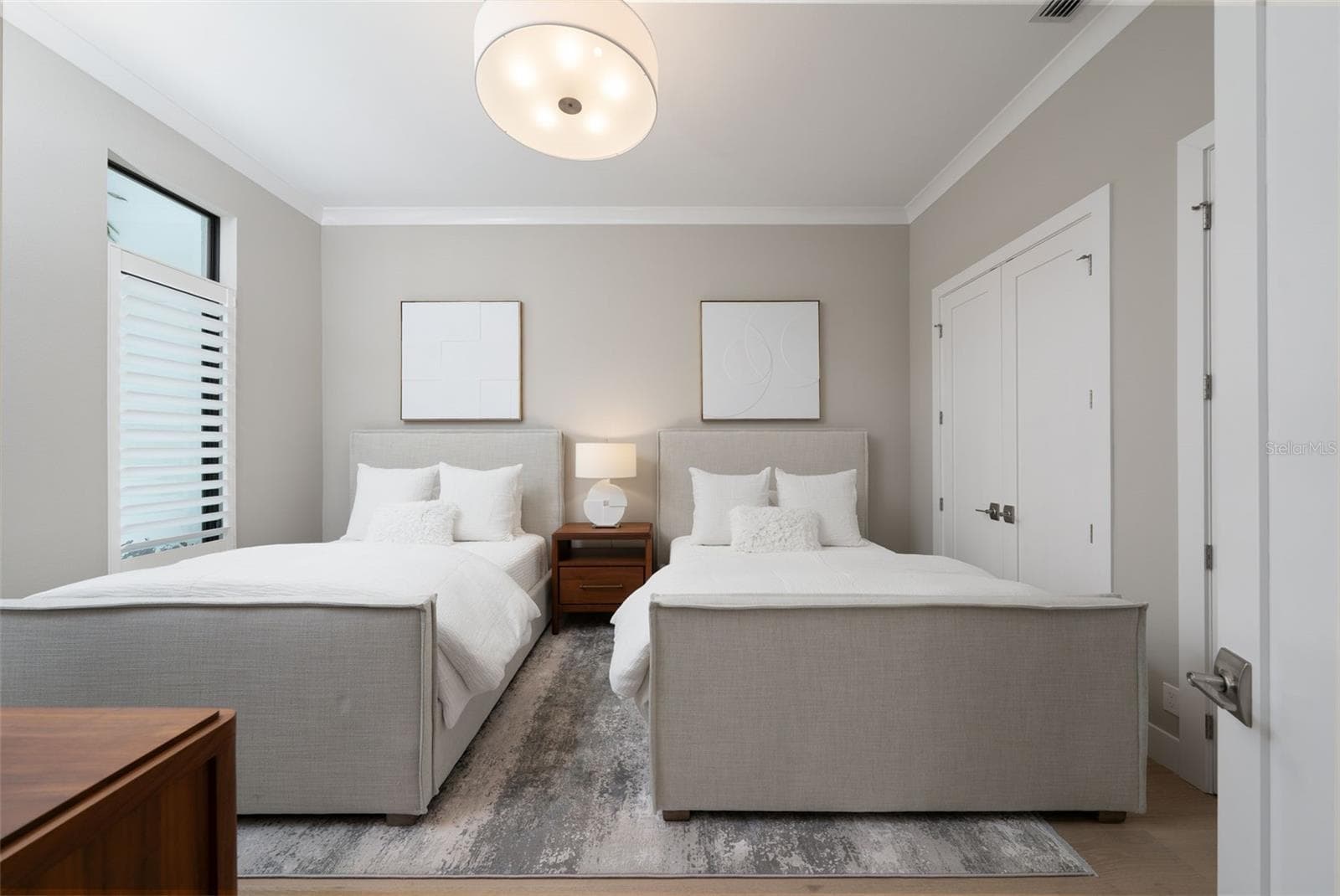The home is designed in a split floor plan with the guest rooms on the opposite side of the home for your guests' privacy. - 11721 RIVE ISLE RUN, PARRISH