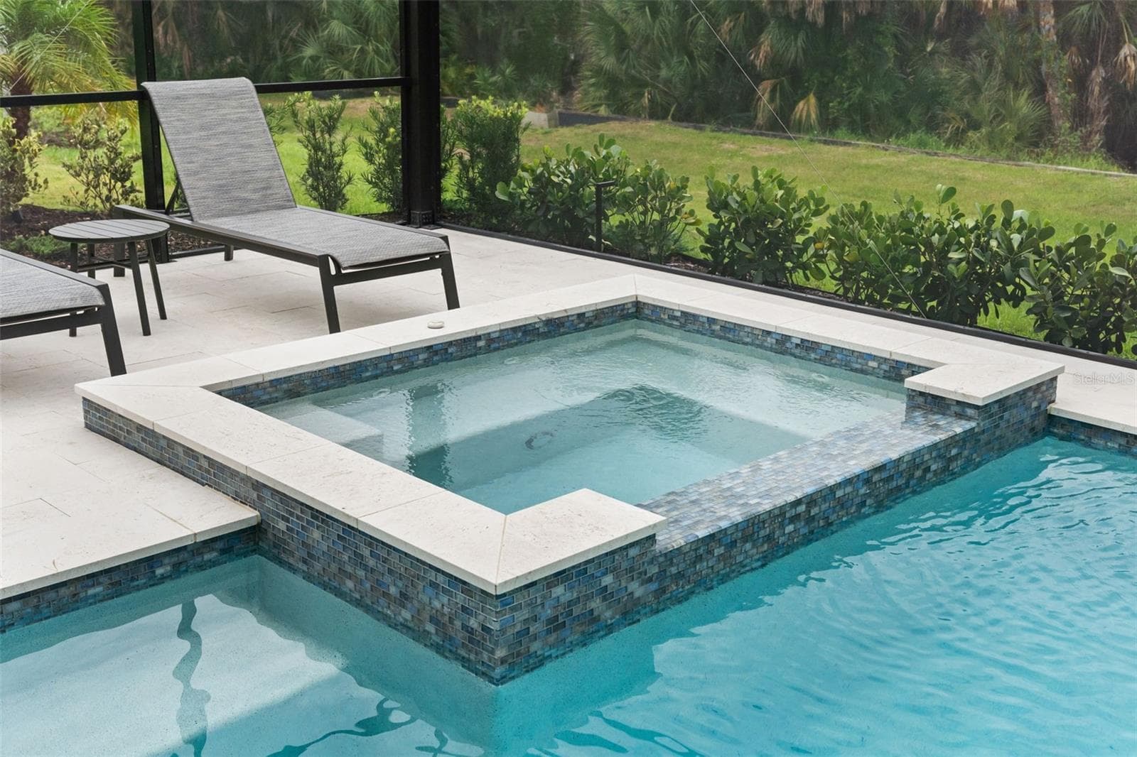 The spa is heated by gas from the 250-gallon tank. - 11721 RIVE ISLE RUN, PARRISH