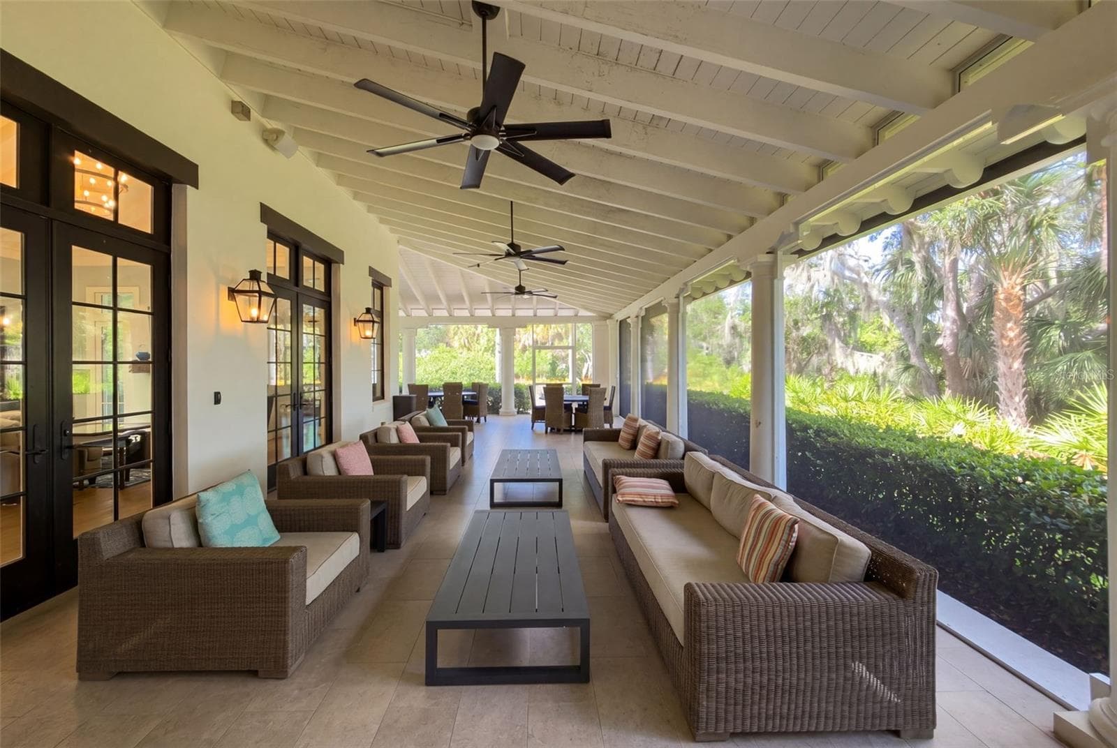 The clubhouse has a large screened-in lanai with an outdoor kitchen. - 11721 RIVE ISLE RUN, PARRISH