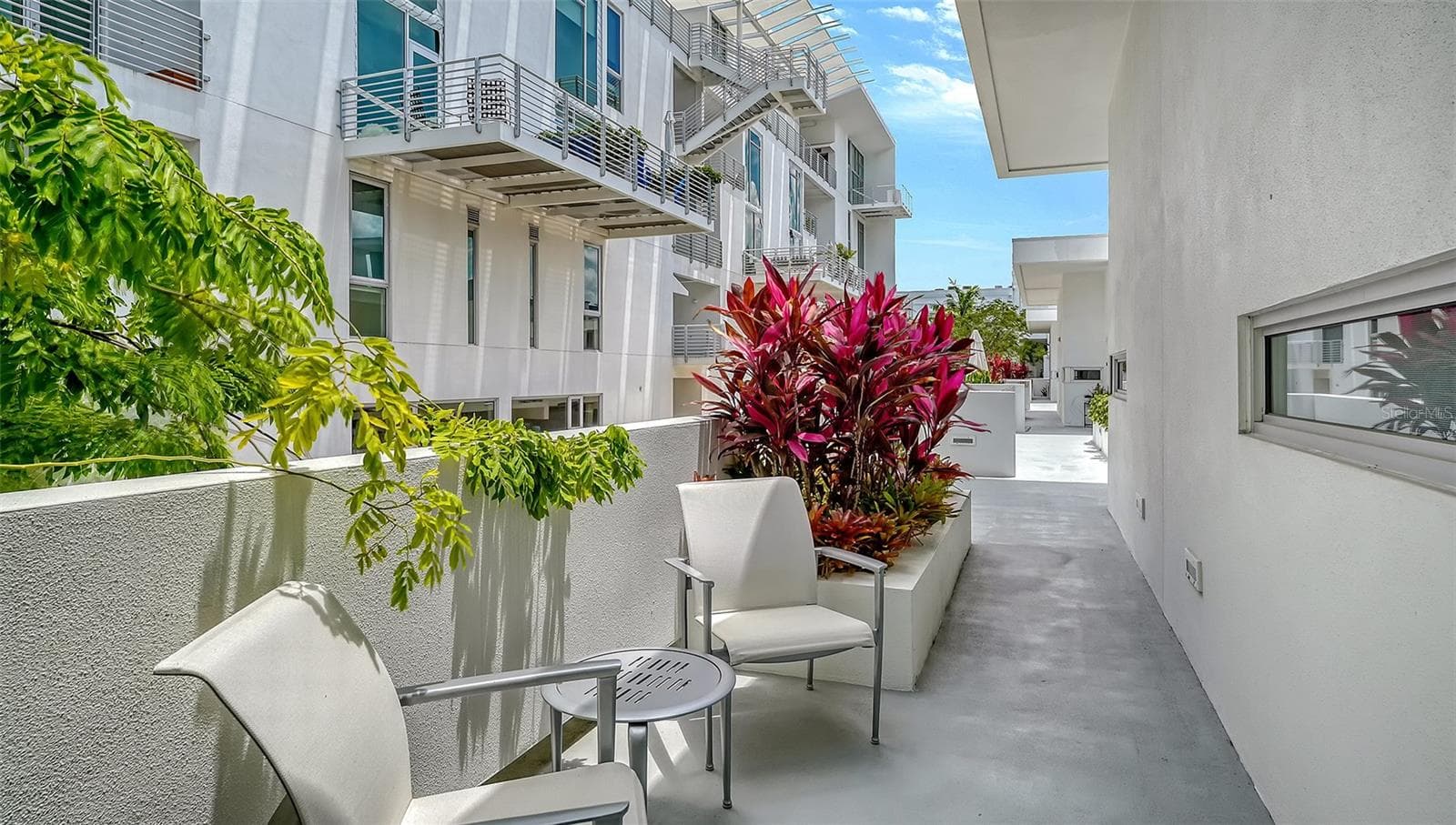 Small private patio near the front entry, ideal for enjoying Florida’s year-round outdoor lifestyle. - 1350 5TH STREET #106, SARASOTA
