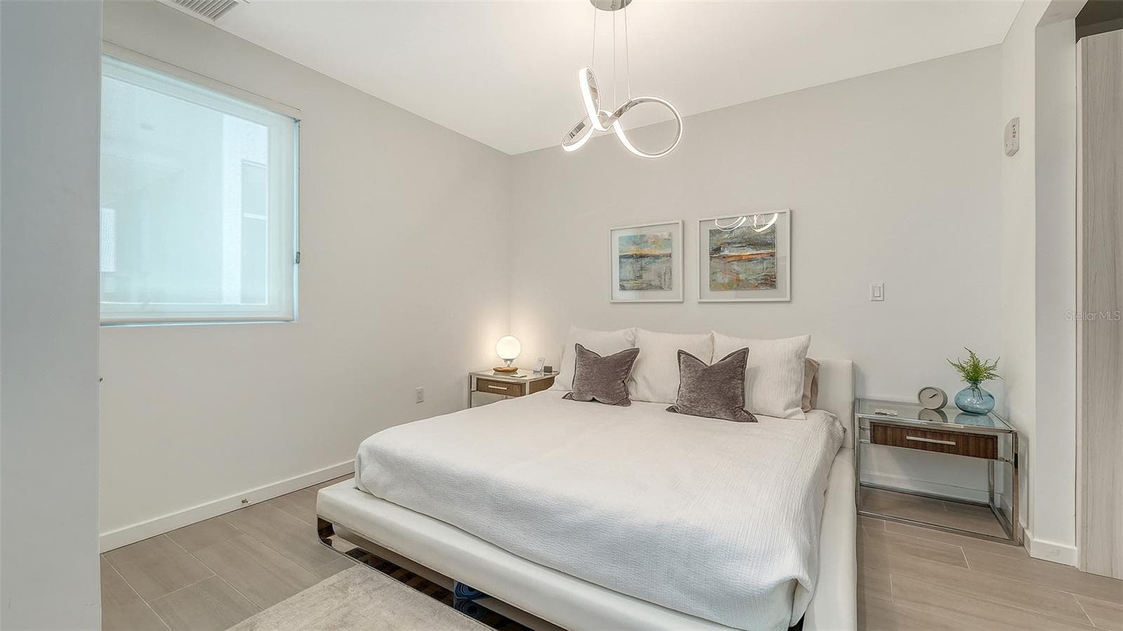 Cozy bedroom welcomes rest and relaxation! - 1350 5TH STREET #106, SARASOTA