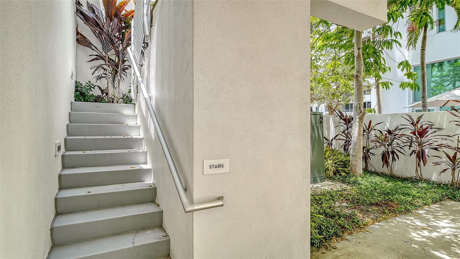Experience the easy access to the end unit very close to the assigned parking space. - 1350 5TH STREET #106, SARASOTA
