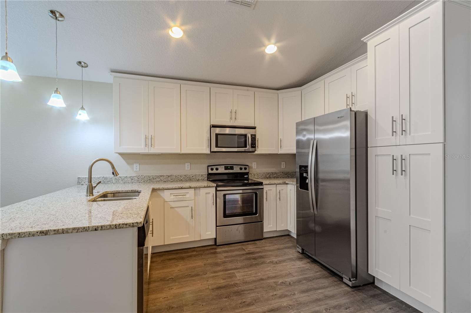 Single Family Residence at 8593 PLUMERIA AVE, ORLANDO, photo 6 of 21