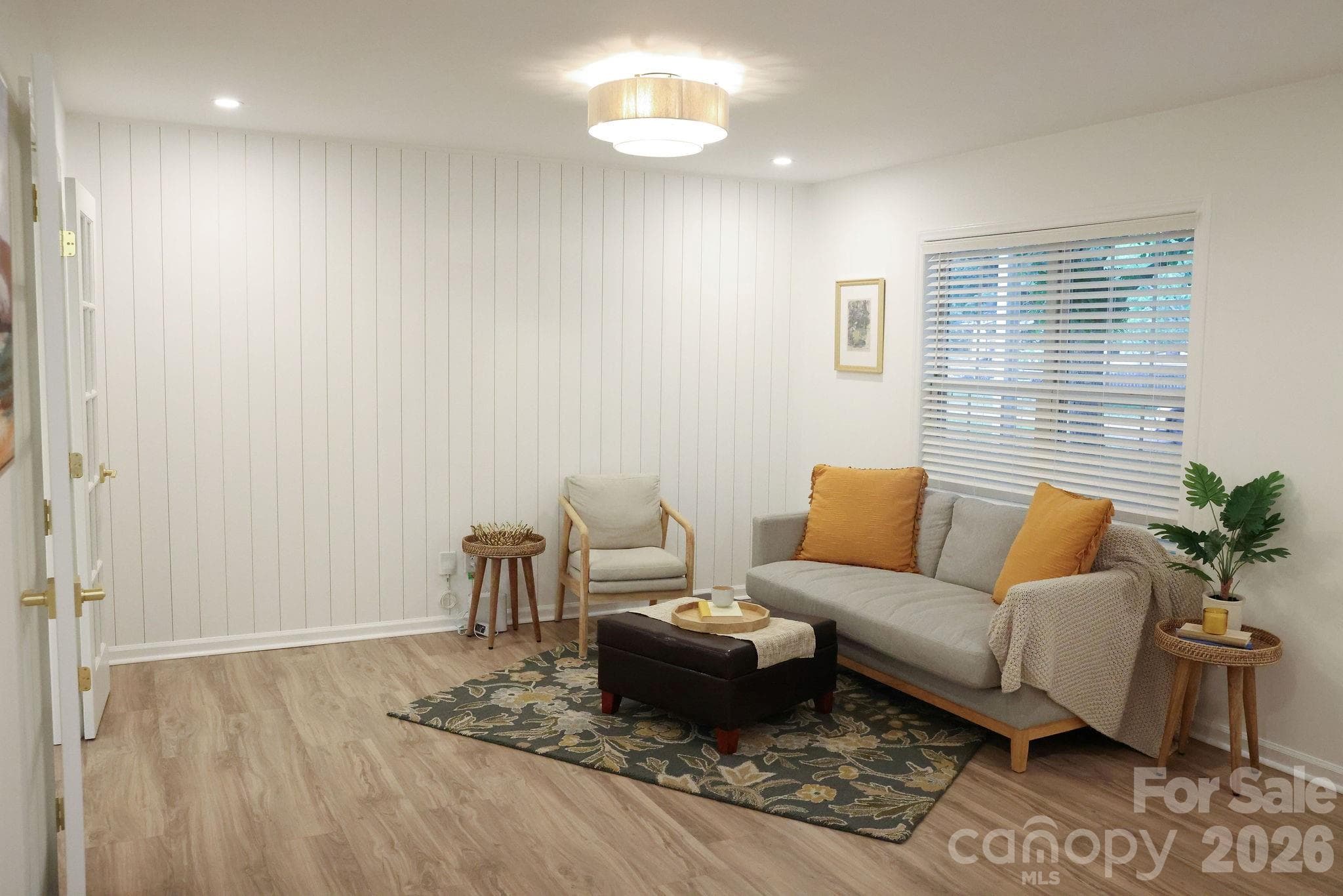 Vertical ship-lap accent wall in living room - Belmont