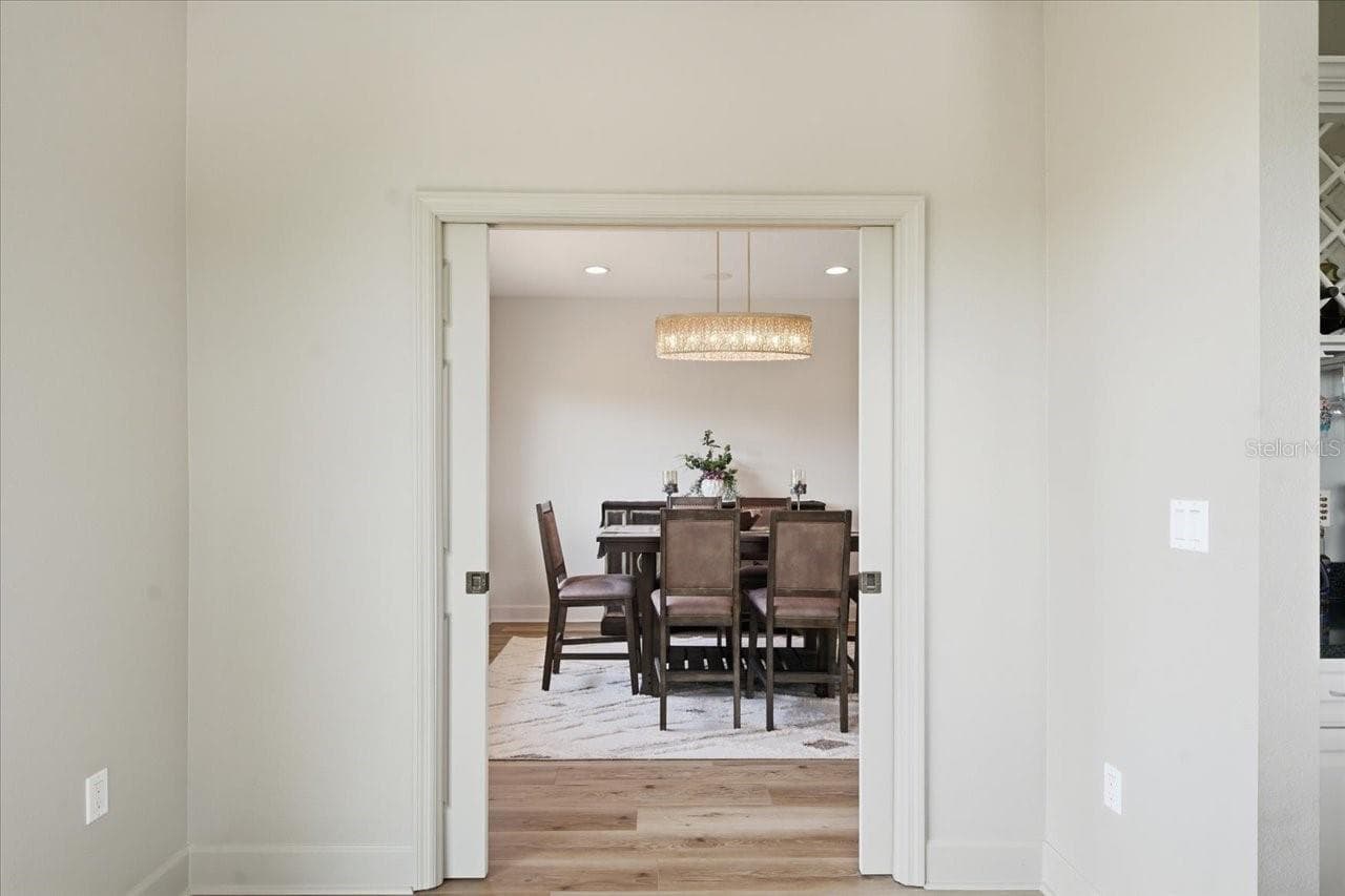 Entry to dining room from kitchen - 1130 S FLORIDA AVE, TARPON SPRINGS