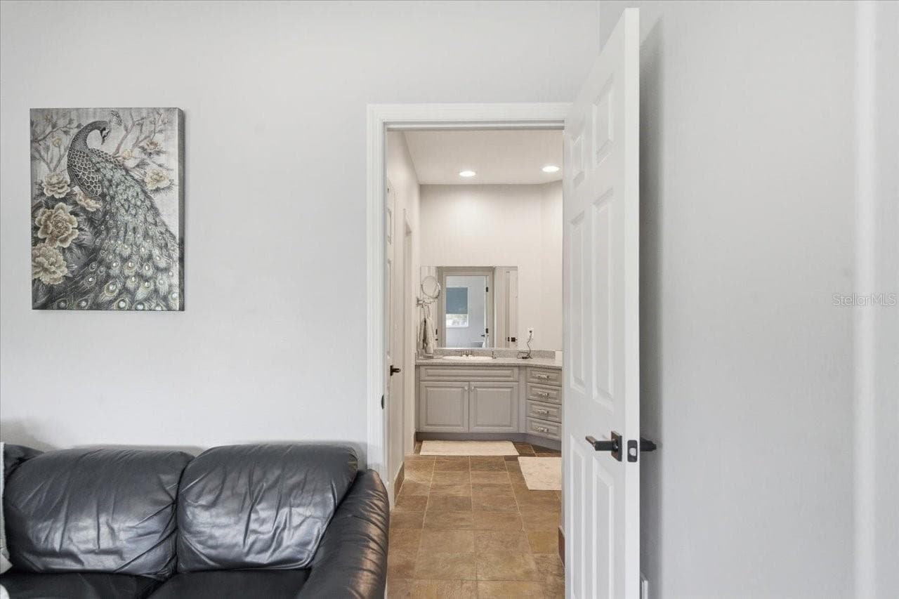 View of jack-and -Jill bathroom from 2nd bedroom - 1130 S FLORIDA AVE, TARPON SPRINGS