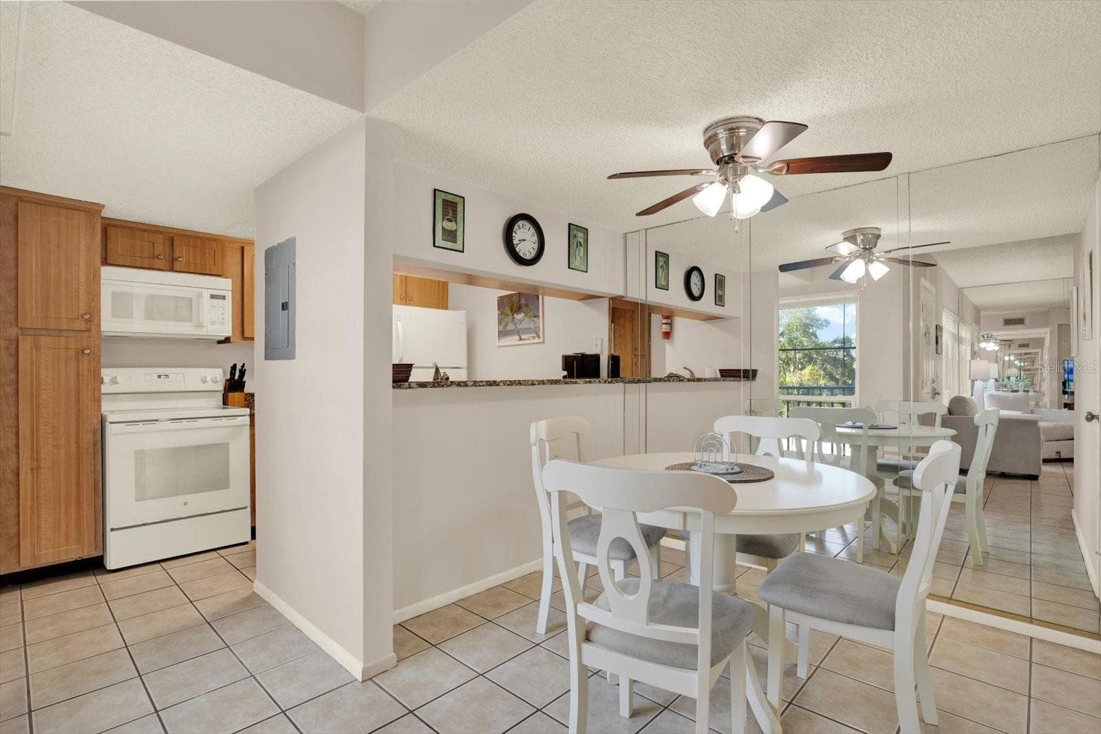 Kitchen and Dining - 169 MEDALLION BLVD #E, MADEIRA BEACH