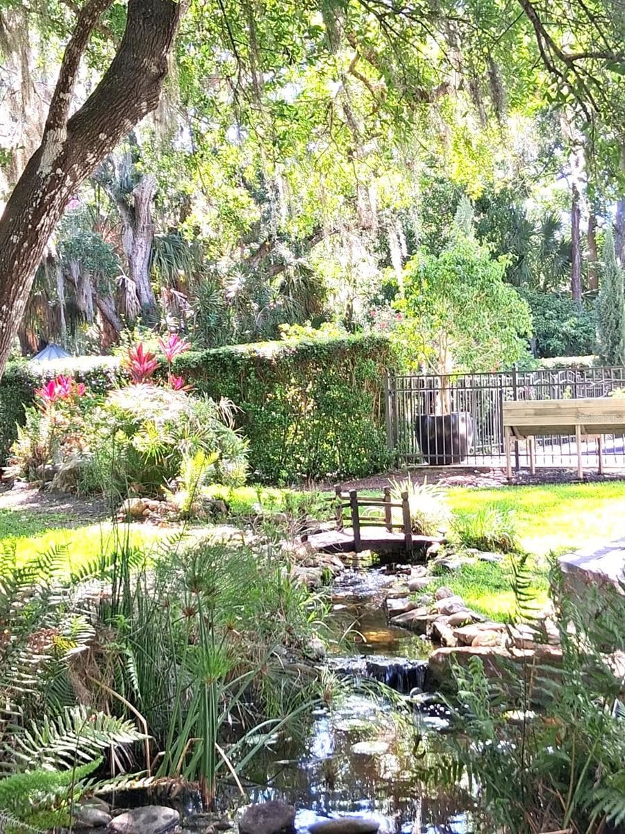 Lovely Creek has been added by sellers for Peaceful afternoons enjoyed on the Custom built authentic Clay Paver deck adjacent. No expenses spared - 3171 DICK WILSON DR, SARASOTA