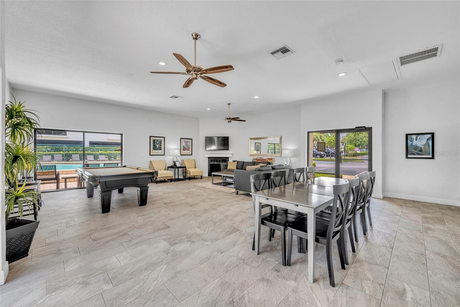 For resident enjoyment, the recently updated community clubhouse is the perfect backdrop to Park West's pool. - 300 CAROLINA AVE #402C, WINTER PARK