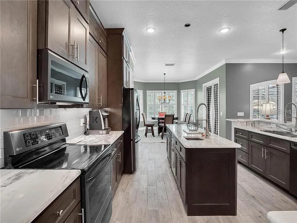 Single Family Residence at 2660 WINNEMISSETT OAKS DR, DELAND, photo 13 of 57