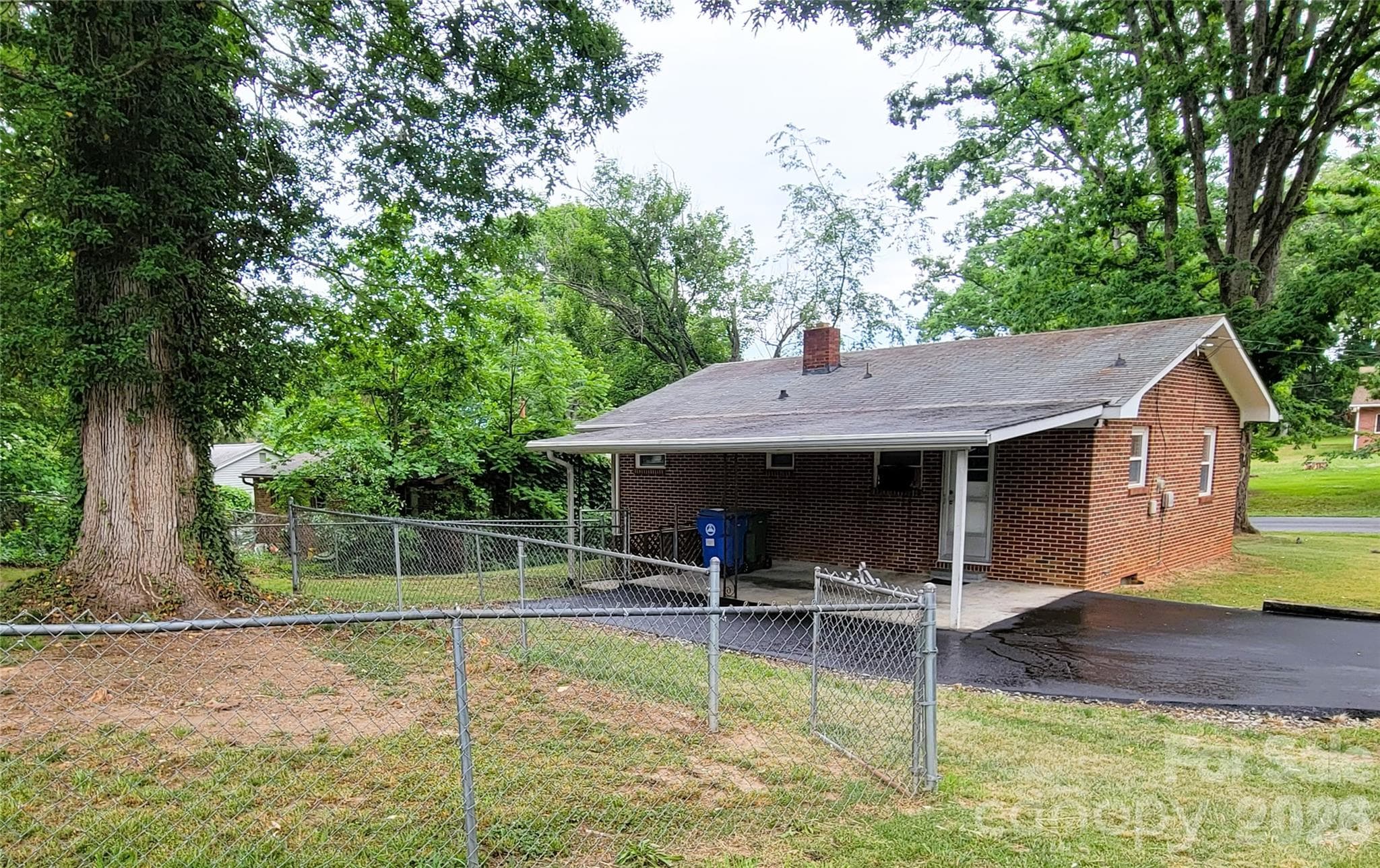 Rear View / Carport - Asheville