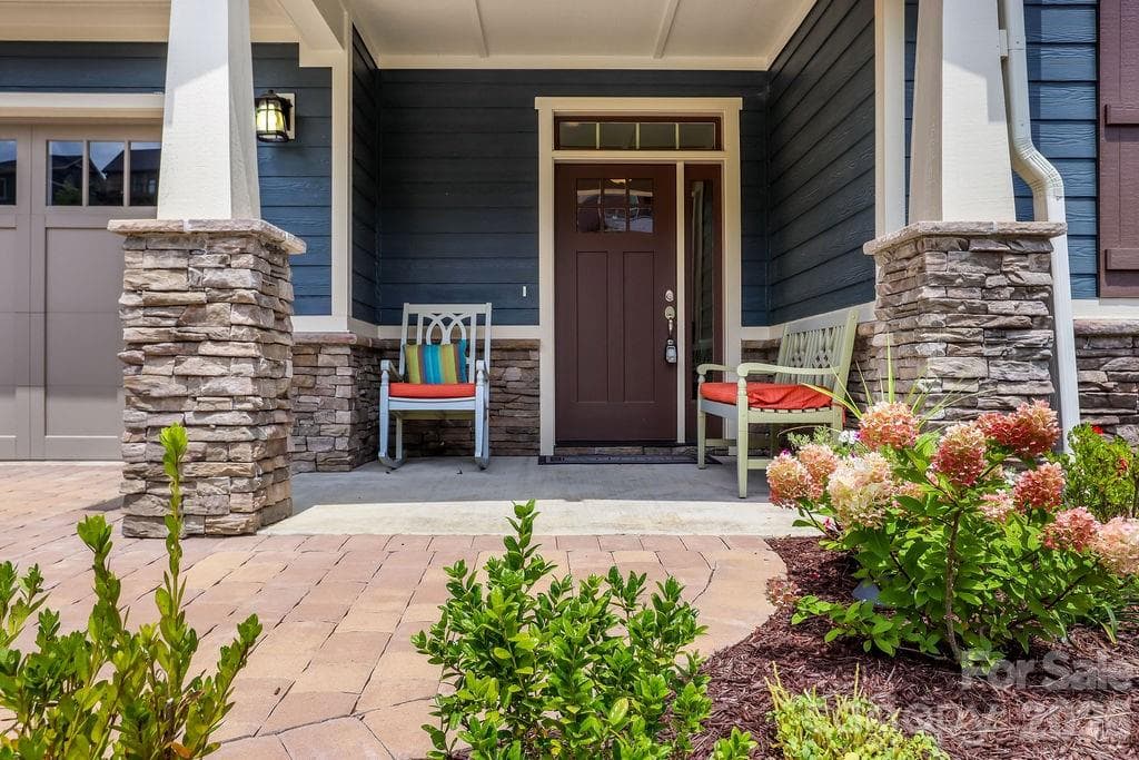 Charming front portico, ideal for welcoming guests or enjoying morning coffee - 19 Craftsman Overlook Ridge, Arden