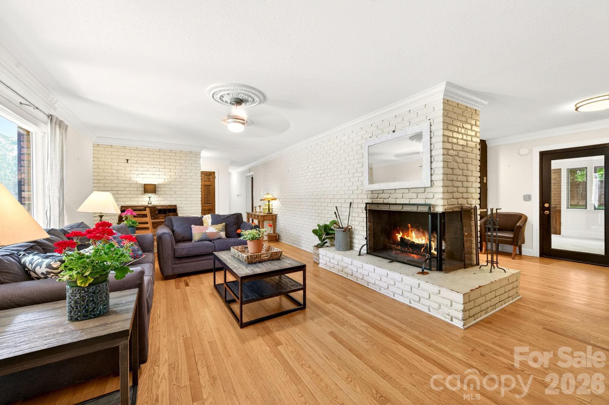 Two sided brick wood-burning fireplace - 25 Bevlyn Drive, Asheville