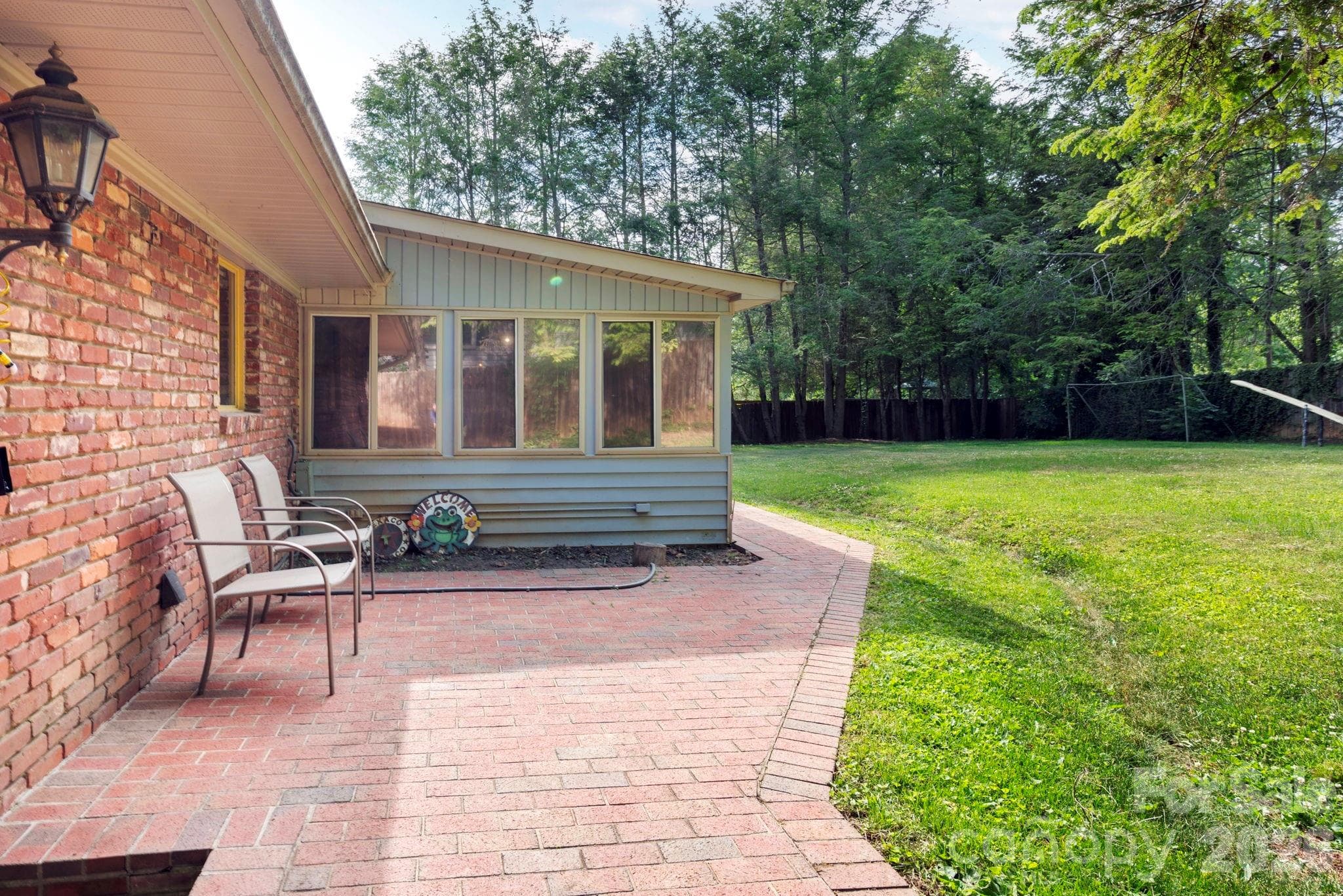 Brick patio in a fenced-in yard - 25 Bevlyn Drive, Asheville