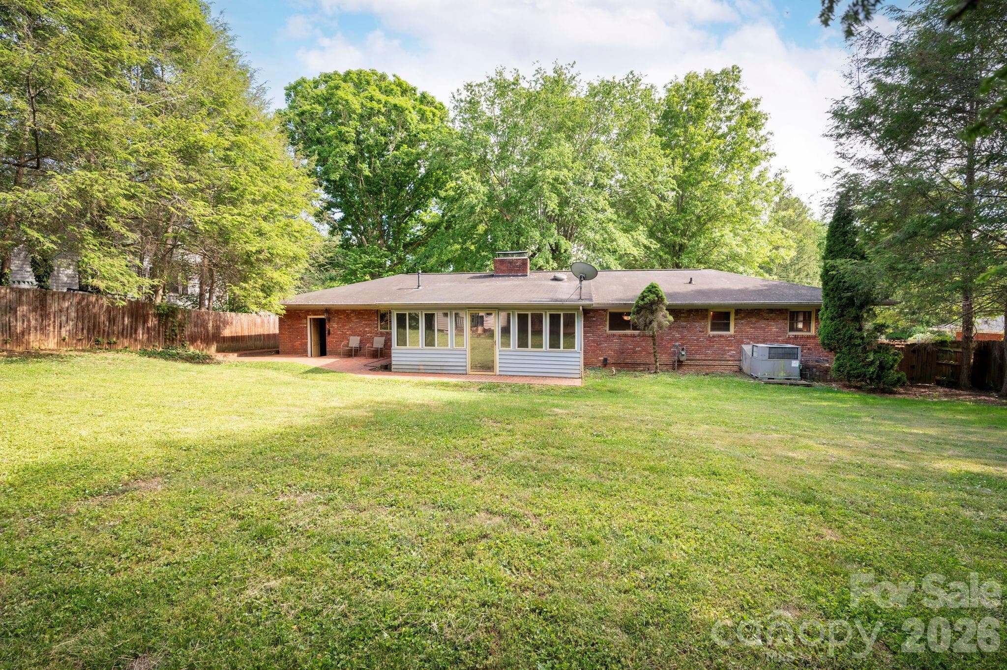 Sunny flat yard ready for play, gardening, or entertaining - 25 Bevlyn Drive, Asheville