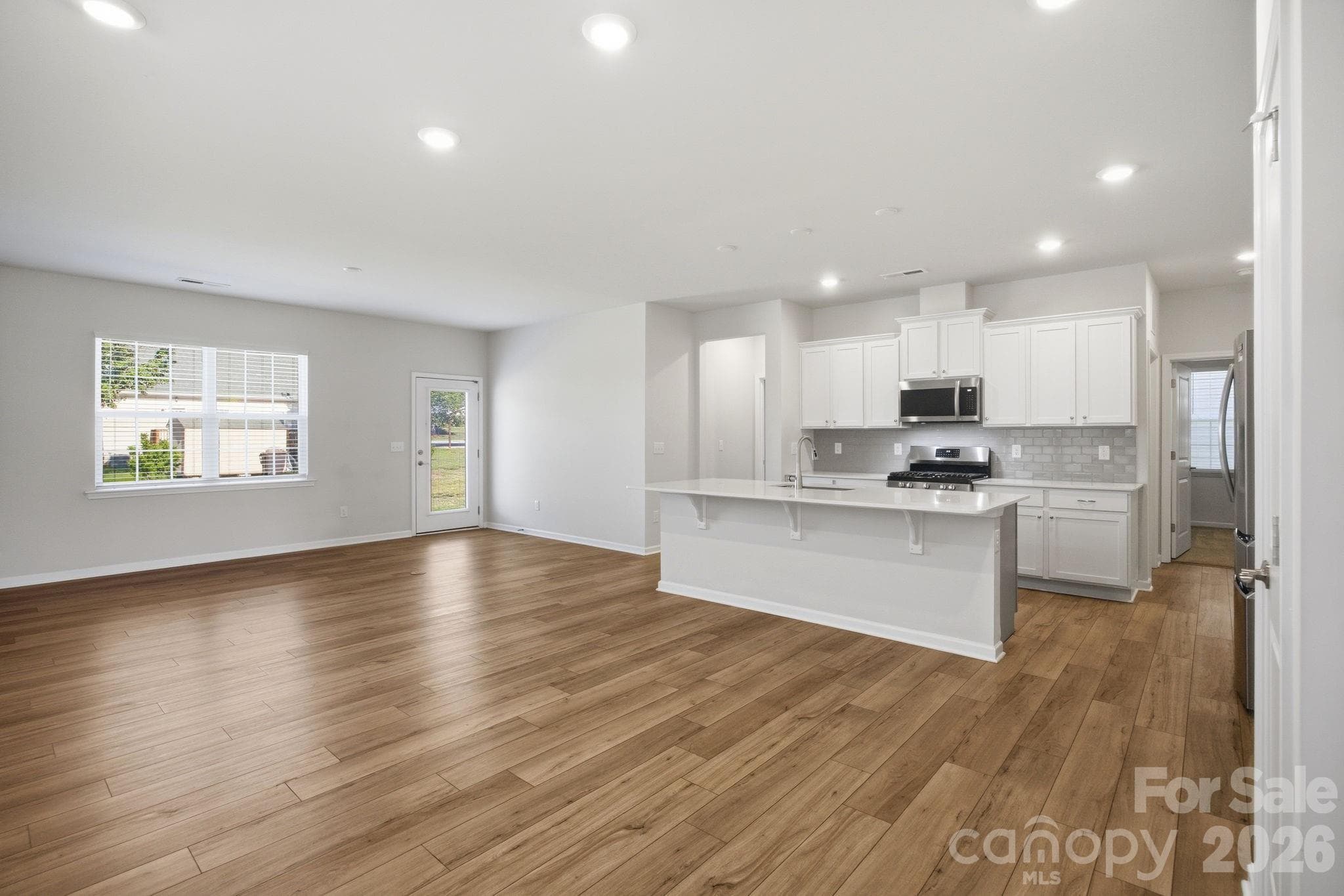 Open concept family room and chef's kitchen - Statesville