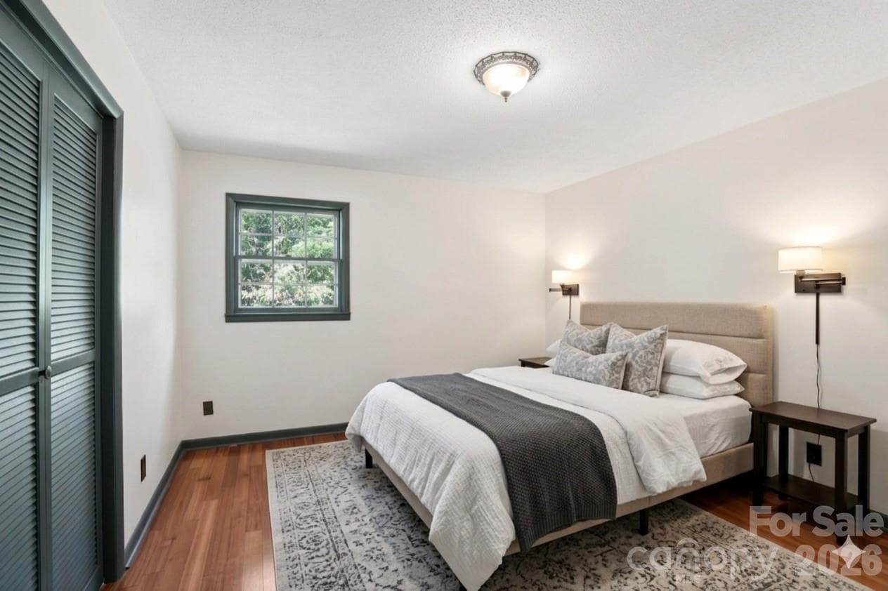 Virtually staged primary bedroom - 38 Nixon Terrace, Asheville