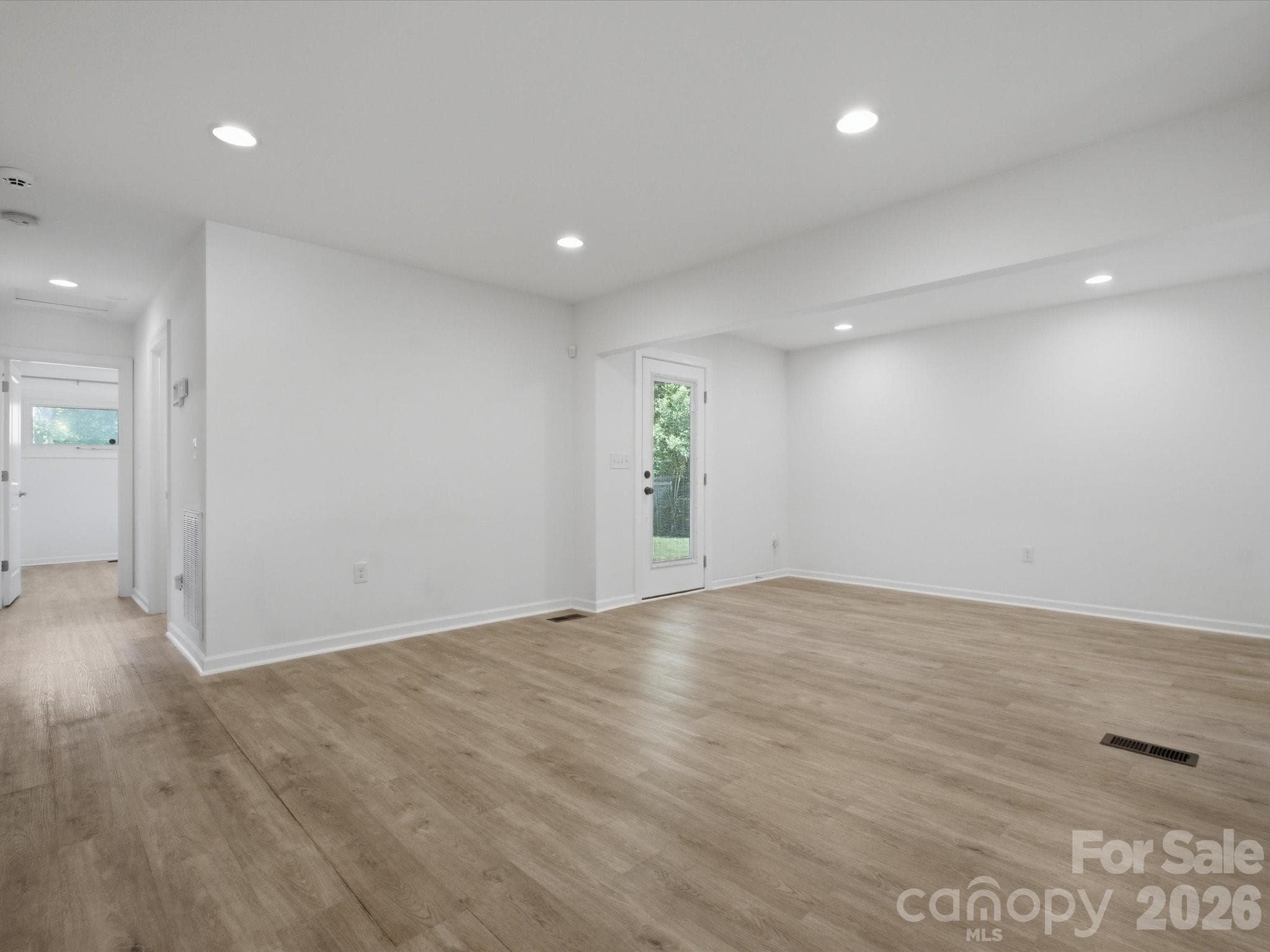 Living, Dining, and Hall View - 3633 Rosehaven Drive, Charlotte