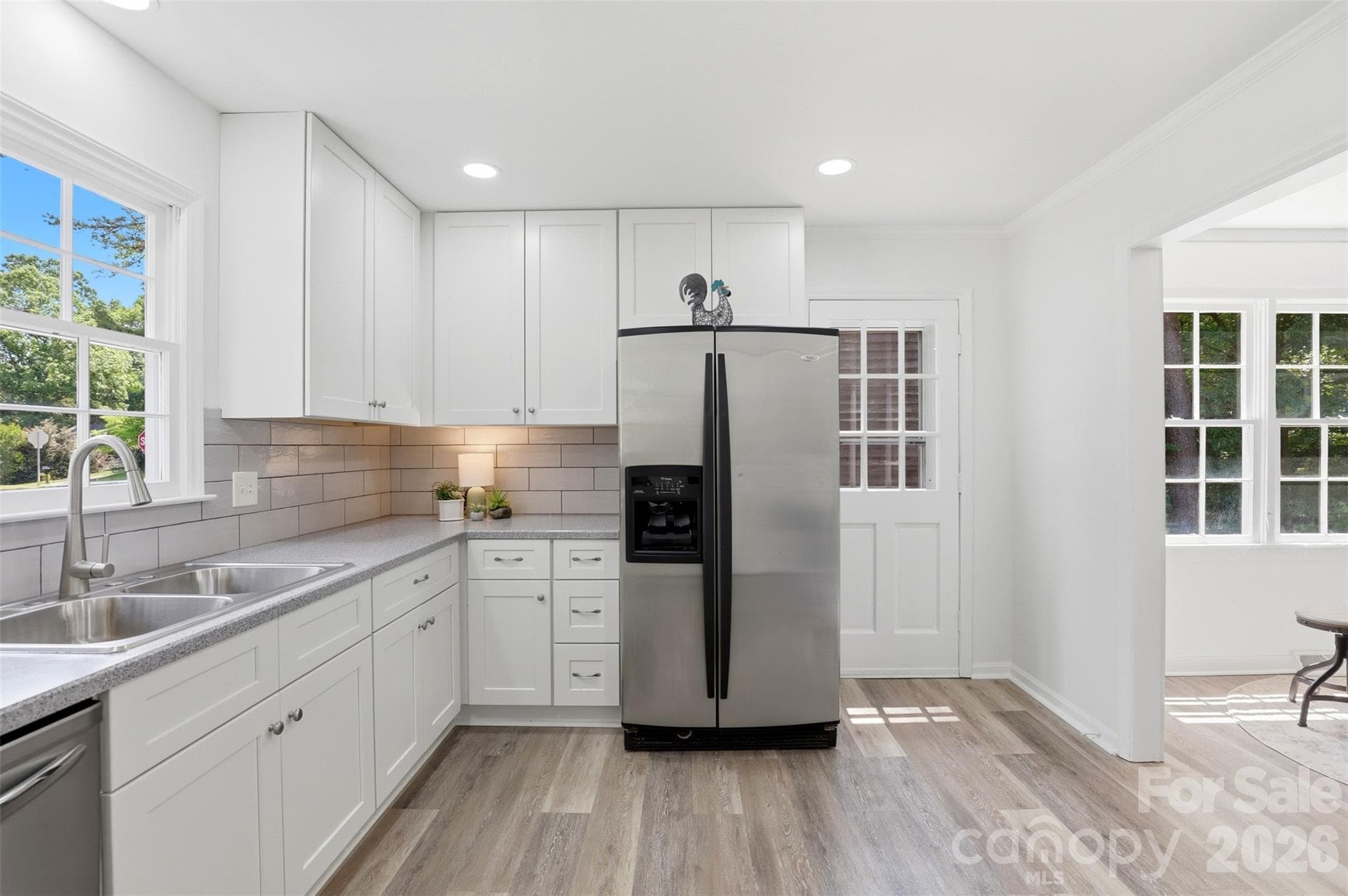 A newer refrigerator with ice maker is included - 9624 Central Drive, Mint Hill