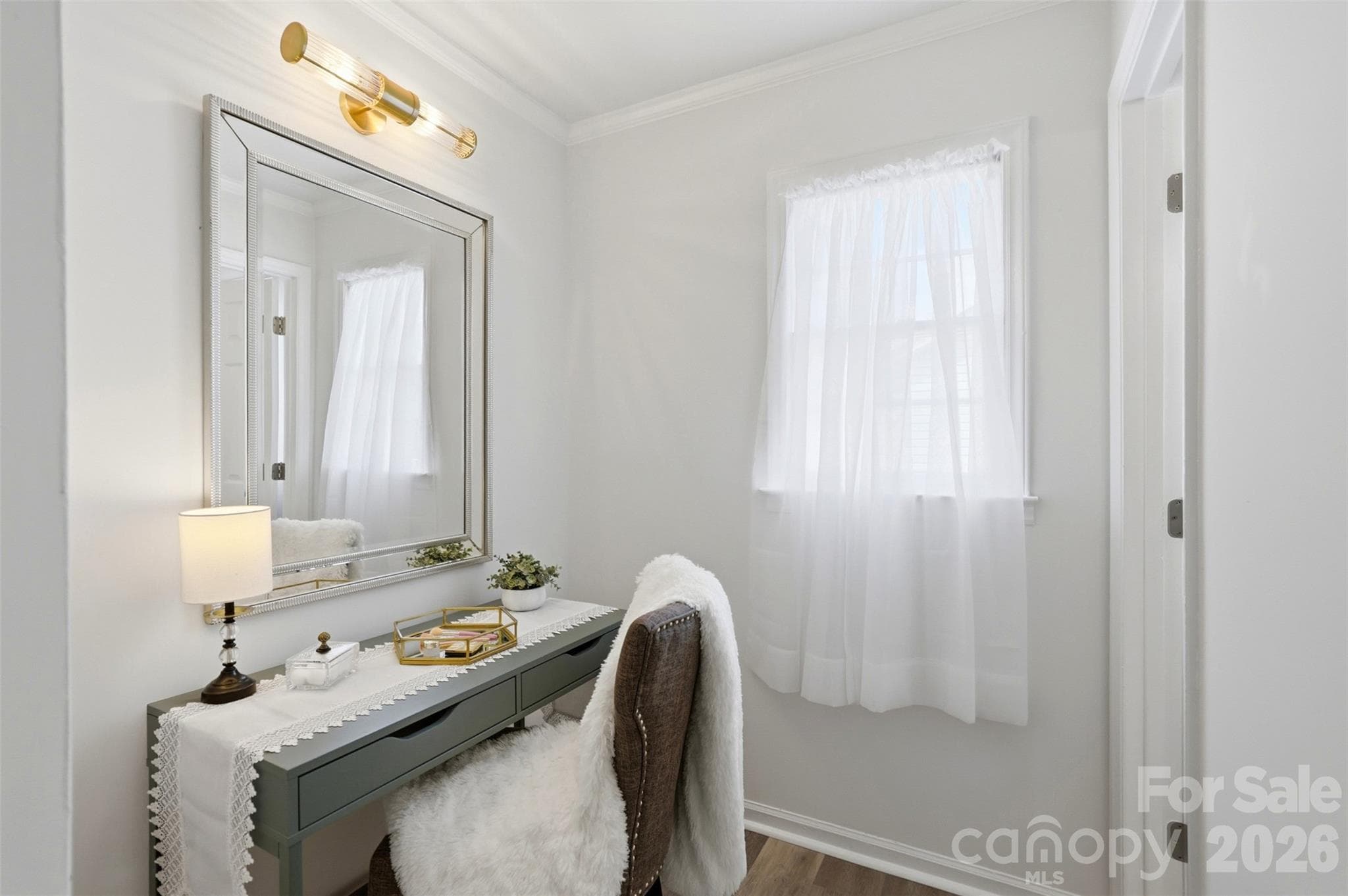 Dressing room off primary bedroom is flooded with natural light - 9624 Central Drive, Mint Hill