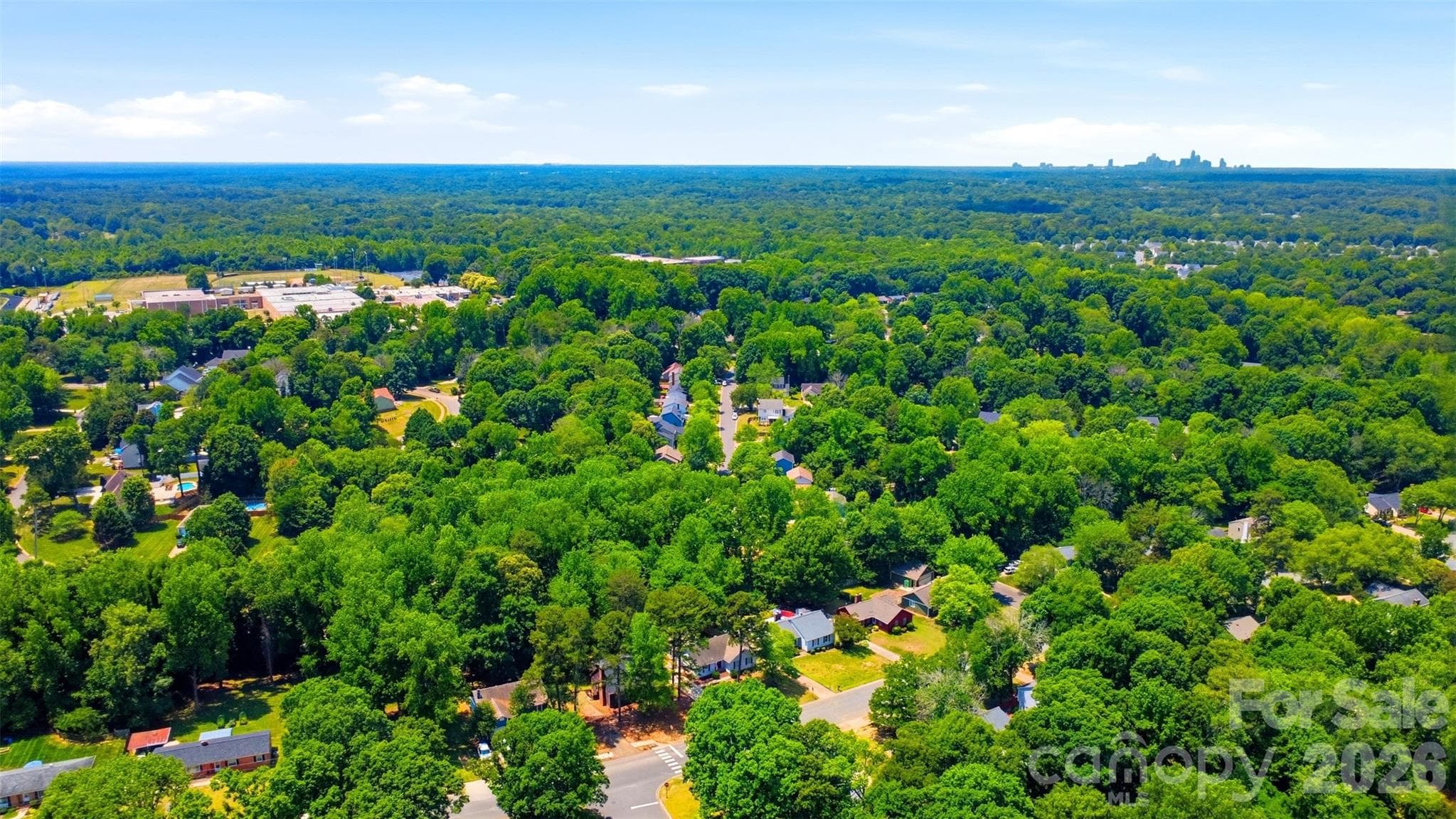 Uptown Charlotte is seen in this vantage point, showing how truly close the commute is from this location. - 9624 Central Drive, Mint Hill