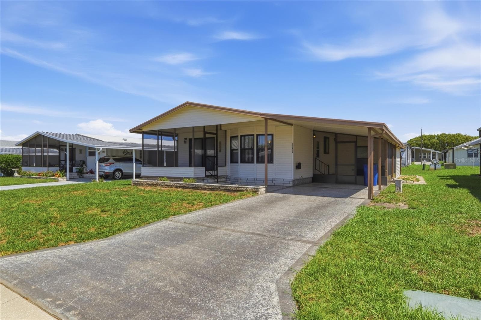 Manufactured Home at 35919 VERANO LN, ZEPHYRHILLS, photo 2 of 23