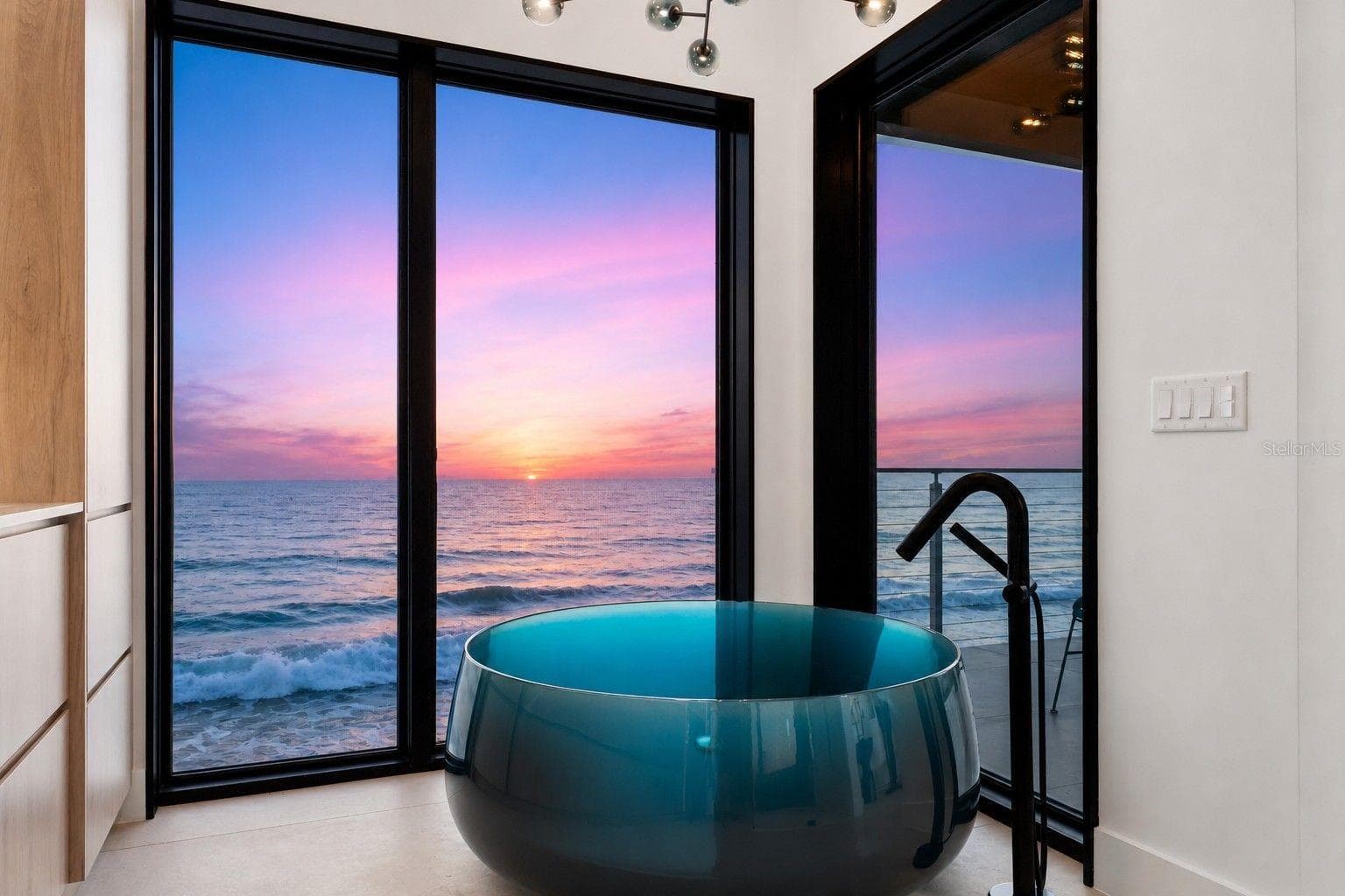 Retreat to your own private spa bath with this view. - 6887 S ATLANTIC AVE, NEW SMYRNA BEACH