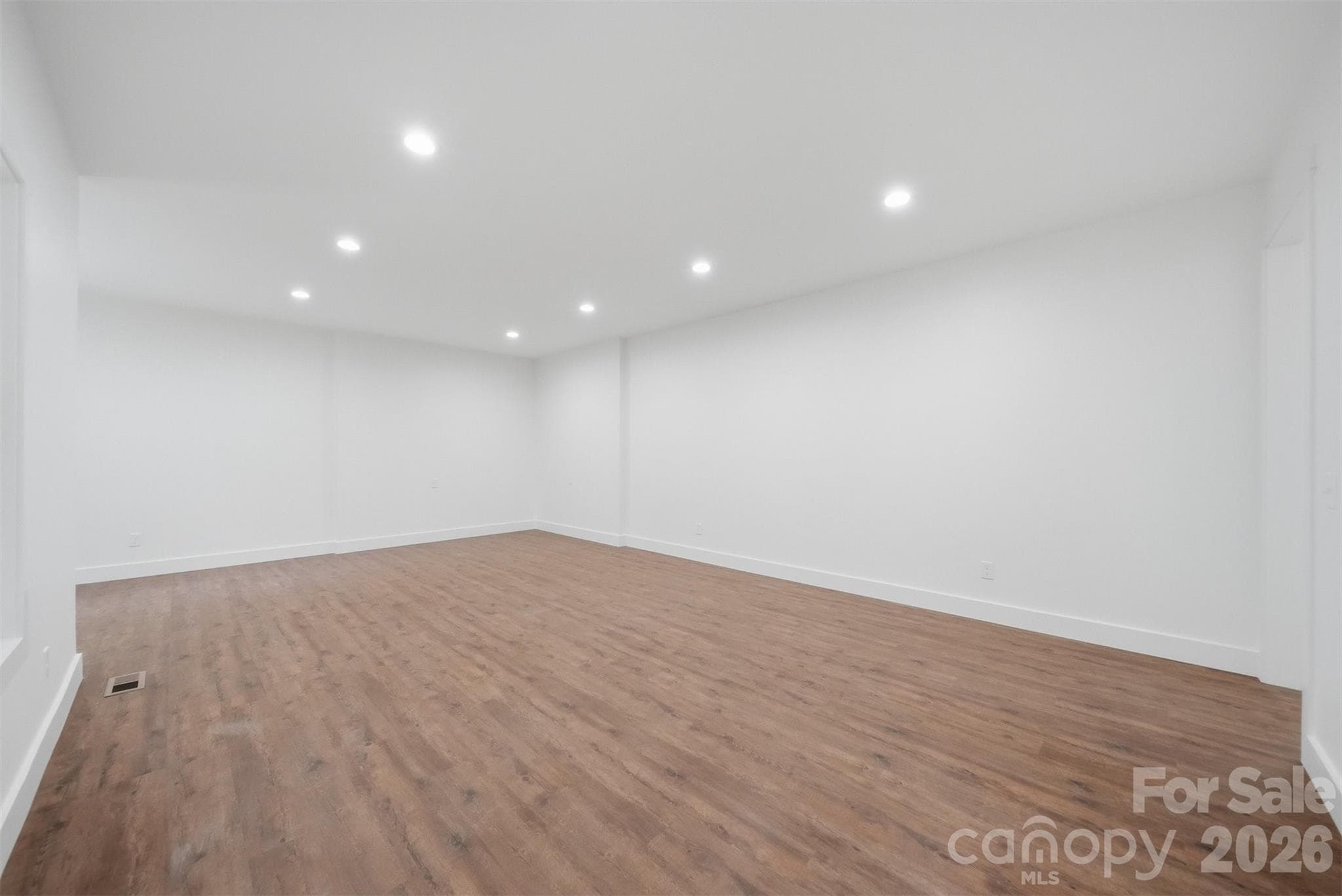 The finished basement has so much space. - 414 Scarlett Oak Court NE, Lenoir