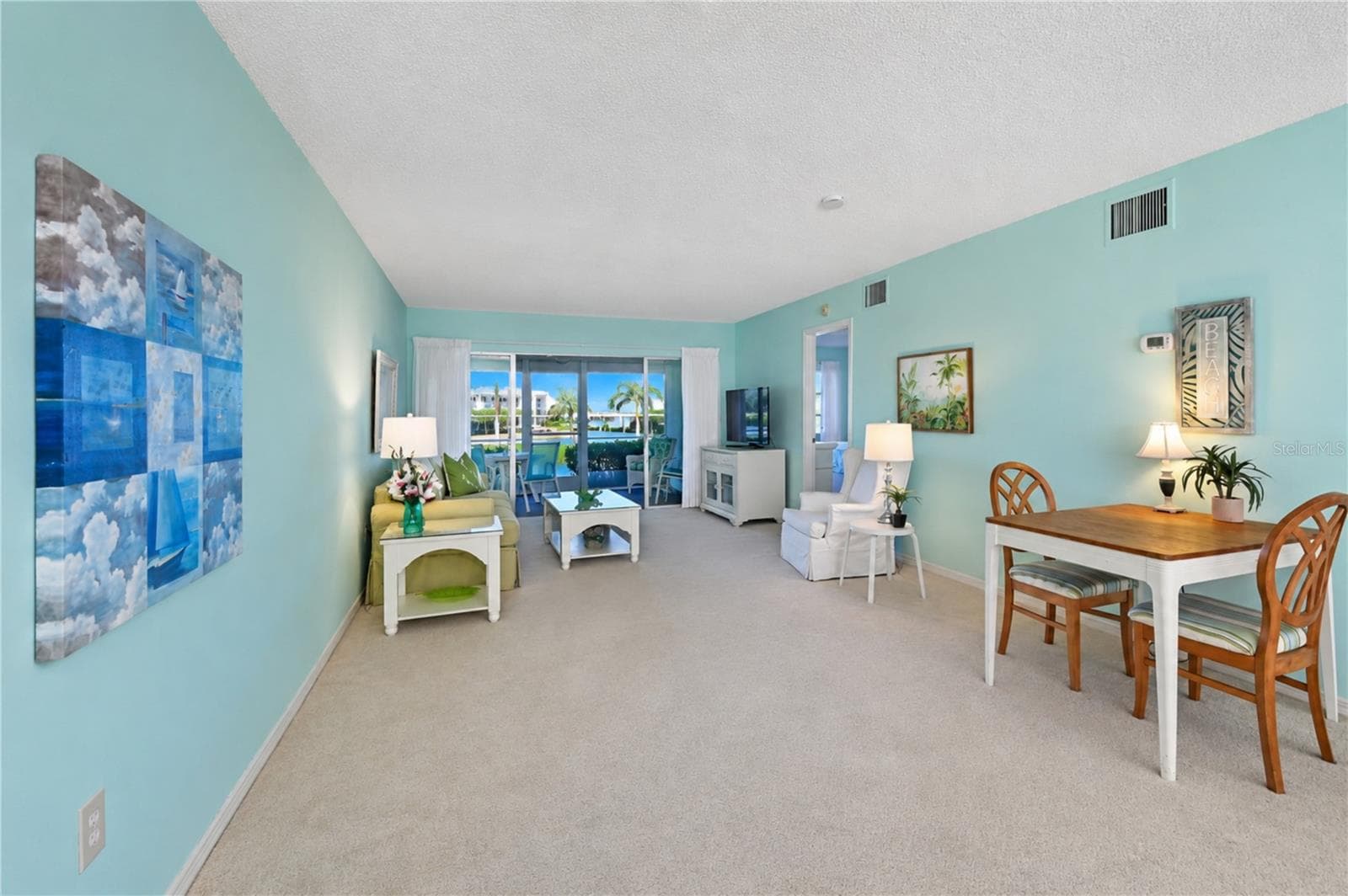 Dining through dining, living and lanai - 4809 INDEPENDENCE DR, BRADENTON