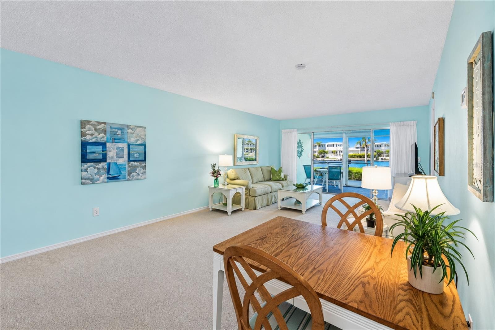 Dining through dining, living and lanai - 4809 INDEPENDENCE DR, BRADENTON
