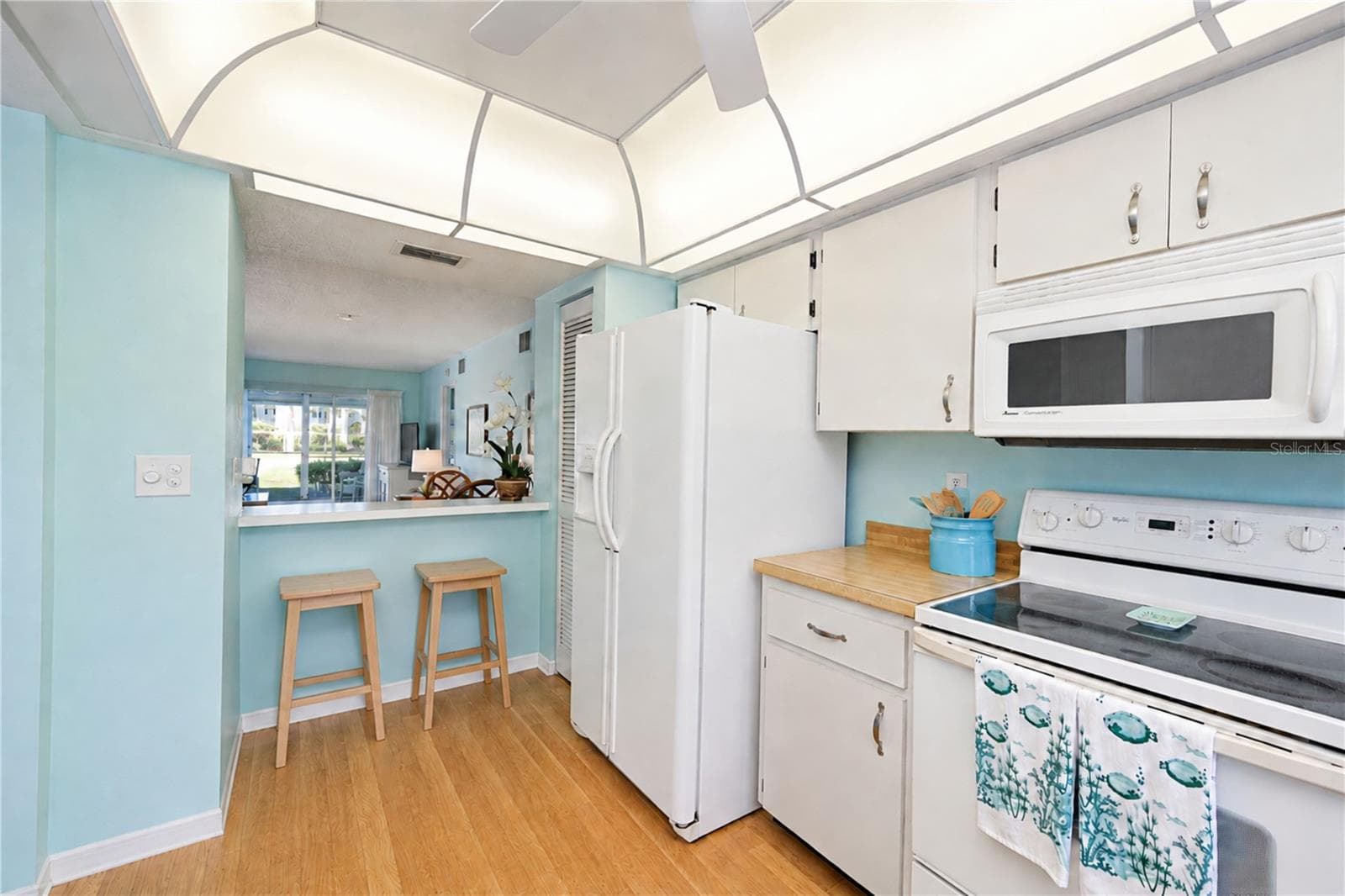 Kitchen from sink over breakfast bar - 4809 INDEPENDENCE DR, BRADENTON