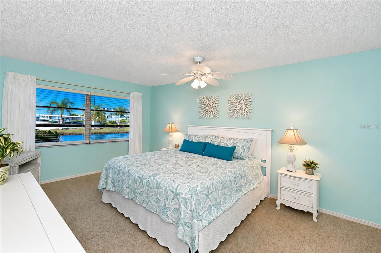Primary bedroom with view of water - 4809 INDEPENDENCE DR, BRADENTON